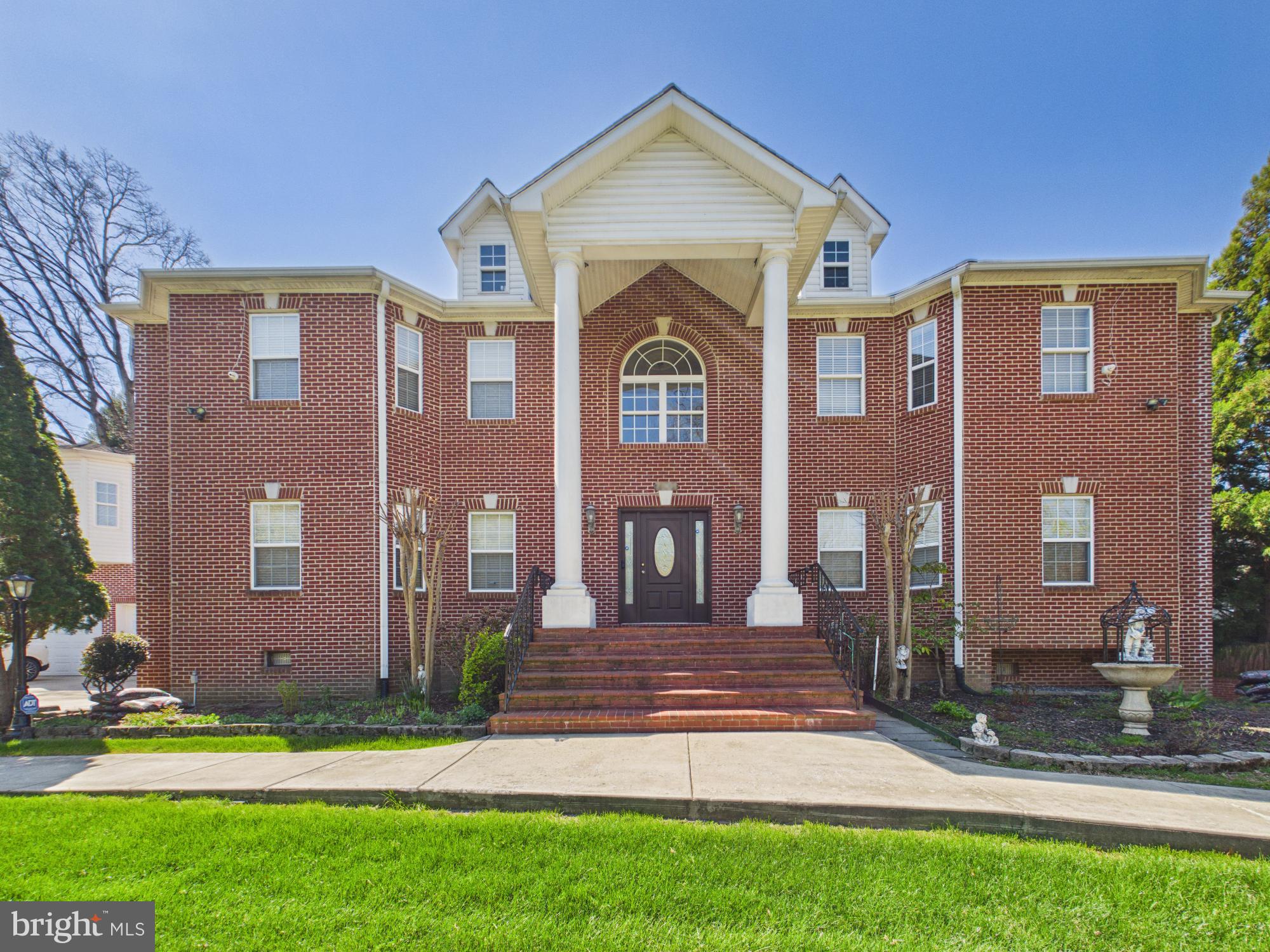 A rare opportunity to own a true estate-style brick Colonial inside the Beltway — with income potential built in.
Major renovation and expansion completed in 2004, including a car garage addition, a garage apartment, and a full rebuild of the main and second levels
Nearly 7,000 sqft of commanding living space
6 Bedrooms | 6.5 Bathrooms | 3-Car Garage
Situated on a premium half-acre corner lot in Holmes Run Heights

Grand two-story entry. Expansive layout. Private suites. Endless flexibility.

Featuring a separate apartment with its own private entrance above the garage — ideal for a rental, guest suite, or multigenerational living.

The fully finished basement offers additional large living space with potential for a second apartment setup, creating even more opportunity.

The property is fully gated with custom automatic metal entry doors, offering privacy, security, and presence.