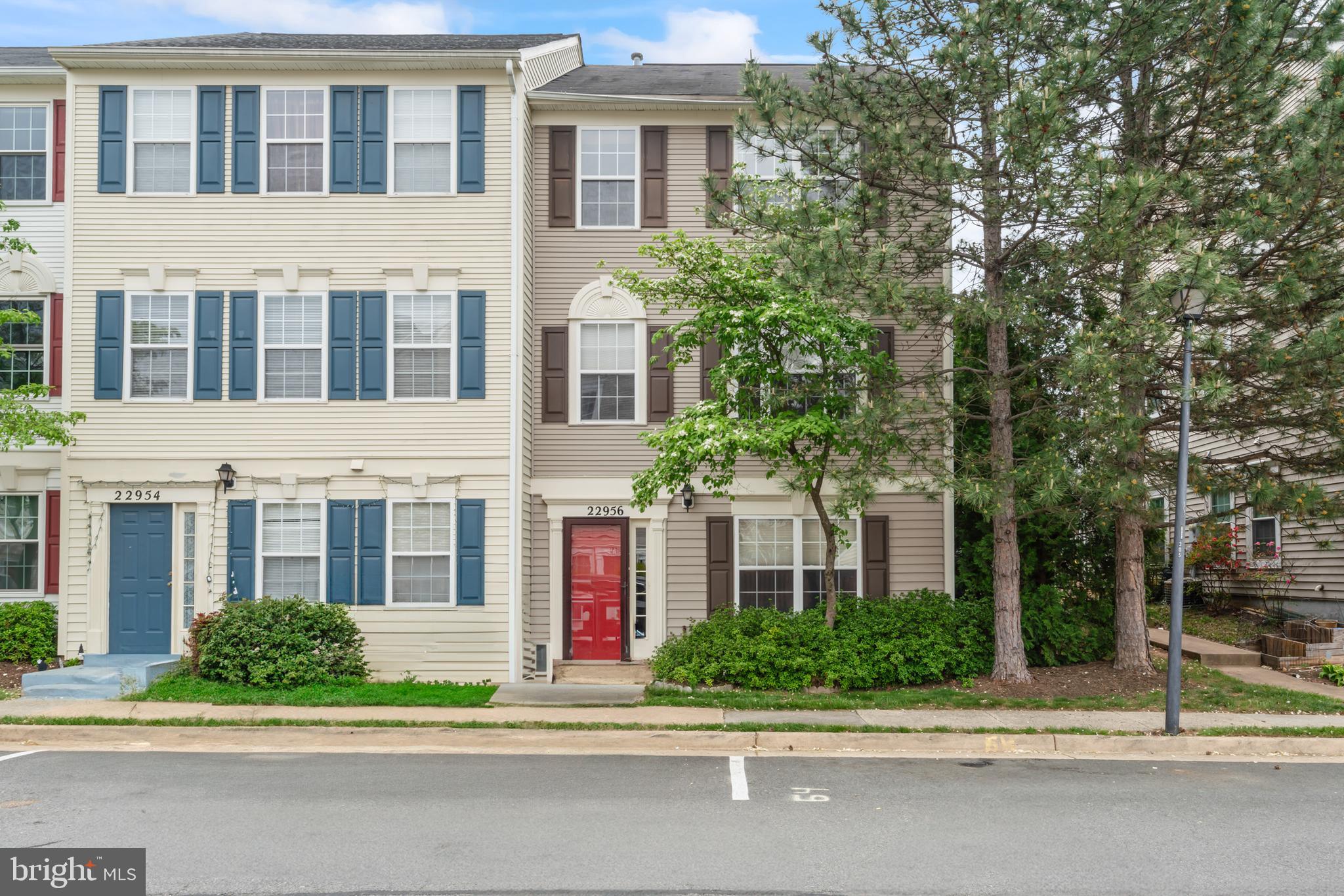 Welcome home to 22956 Regent Terrace! This beautifully updated end-unit townhome nestled in the sought-after Grovewood community of Sterling. With 3 spacious levels, 4 bedrooms, 3 full bathrooms, and a detached 2-car garage, this home is thoughtfully designed to offer both comfort and convenience. Step inside to discover a bright and open floor plan with brand-new luxury vinyl flooring, fresh updates throughout, and a newly renovated kitchen featuring quartz countertops, stainless steel appliances, and a stylish tile backsplash. The main level offers flexible space with a private bedroom or office, a full bath, and a spacious rec room—ideal for guests, remote work, or multi-generational living. Enjoy natural sunlight pouring through the extra windows only an end unit can offer. The open-concept kitchen flows seamlessly to the dining area and inviting living room with a charming two-sided fireplace, perfect for cozy gatherings. Step out onto the expansive deck to relax or entertain. The primary suite is generously sized with ample closet space, and the home offers thoughtful touches like updated bathrooms, plenty of storage including a pull-down attic, and a dedicated laundry room. Conveniently located just minutes from Dulles Airport, Route 28, the Innovation Center Metro, and the W&OD trail, this home truly has it all—comfort, location, and space to grow.