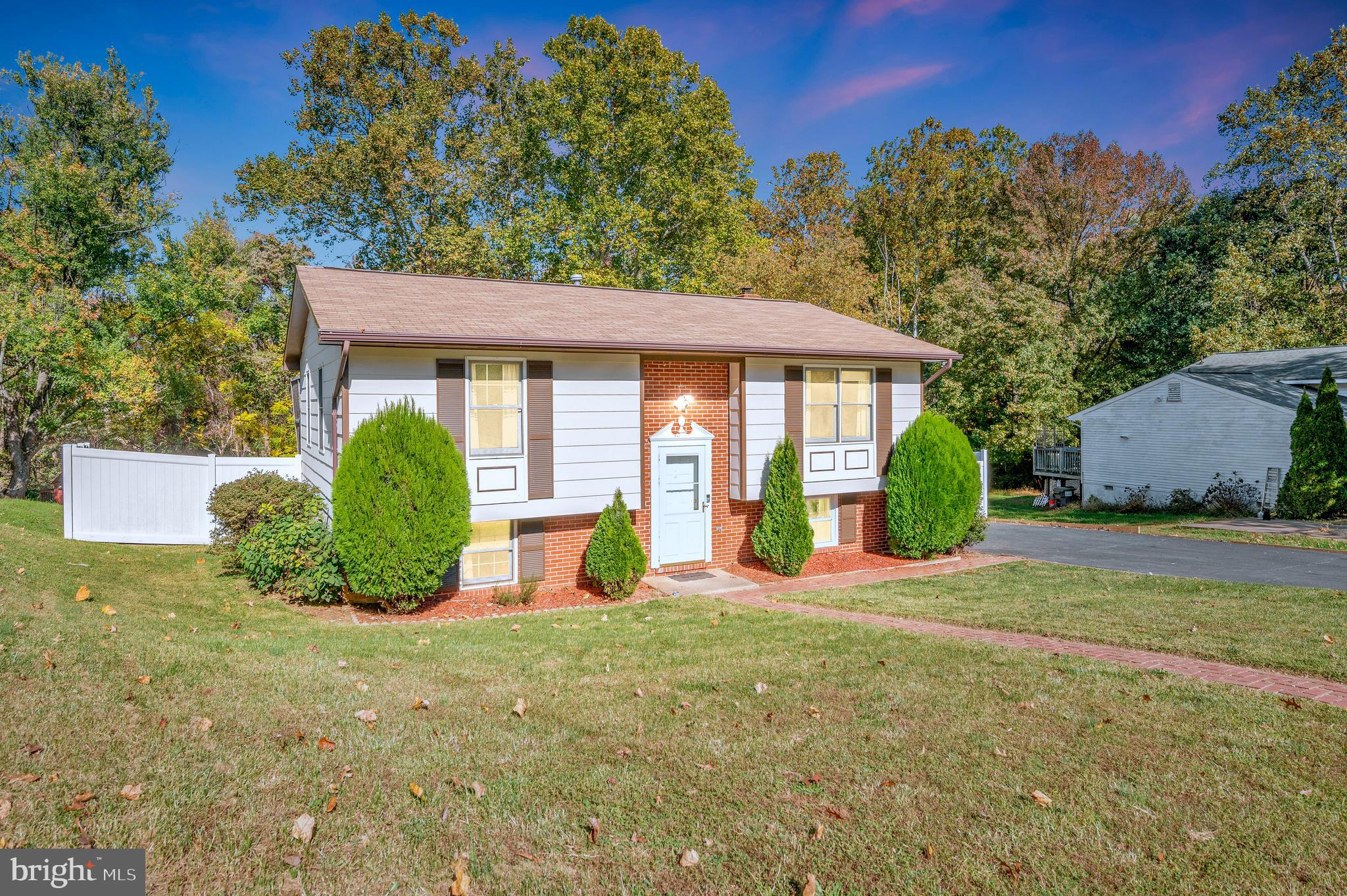 Sellers are MOTIVATED to sell!!  Welcome Home! This amazing and well-maintained home features 4-bedrooms, 2 full bathrooms, recently updated kitchen with granite waterfall countertops, and large family room addition . It is ready for a new family to make it home. Located in the highly sought after community of Chancellor Green, surrounded by an abundance of amenities.  The upper level boasts 2 bedrooms, a full recently updated bathroom, living room, recently (2020) renovated gourmet kitchen with stainless steal appliances and plenty of storage, and a 20 X 14 addition that could be used anyway you choose.  The lower-level features 2 more bedrooms, a full, recently renovated bathroom and an oversize family room with woodburning stove and laundry room.  The gourmet kitchen is to die for, with gorgeous granite waterfall countertops, crisp new white custom cabinets with easy close feature and plenty of storage, stainless steel appliances, gas stove, stunning custom backsplash, tile floors, and built in microwave. The owners added an oversized additional off the kitchen to entertain family. This room is flexible and could be used anyway you chose, with new windows, LVP flooring and access to a sizable, wood deck that leads to the backyard. The main living area has newer LVP flooring that extends down the hallway to the bedrooms and bathroom. The two upper-level bedrooms have fresh paint and are sizable. Both bathrooms were renovated in 2023 and feature tile floors, new vanities and custom tile in the lower-level tub/shower combo. The family room in the lower level is the perfect spot to hang out with family, new LVP flooring, toasty wood burning stove for those chill nights, shiplap ceiling, and custom removable wallpaper adds so much charm to this inviting area. The laundry room is just off the family room, washer and dryer that convey as is.  The family room leads you outside to the beautifully manicured back yard, adorned with a variety of flower species. A large deck surrounds the 2yr. old, above ground pool you’ll enjoy coming home to during those hot summer days. The new 6 foot, white, vinyl fence encompasses this peaceful and private retreat, backing up to the communities open space area. Additionally, the HVAC and new hot water heater were installed this year. The exterior of the home was painted and new gutters installed in 2023.  Newly installed Ecobee thermostat. Ring doorbell and simply safe security system. Please do not hesitate to call today to schedule your showing, this home will not last.