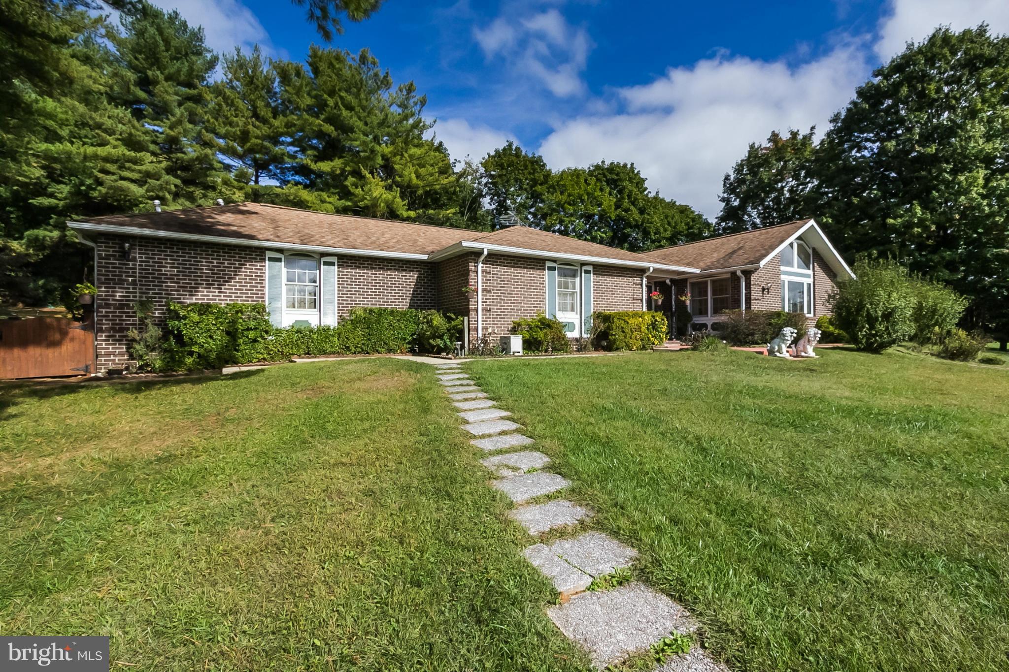 All on one level! Huge 5BR, 3.5ba rancher has an open floor plan - kitchen flows to family rm w/ fpl, sun rm, large DR & LR w/ vaulted ceiling. Loads of natural light! Updates include remodeled bath, new carpet & paint. MB w/ private bath & jet tub. Additions make total living area 3494 sq ft above grade. More space on fully finished lower level. Set on a landscaped lot at the end of a cul-de-sac.