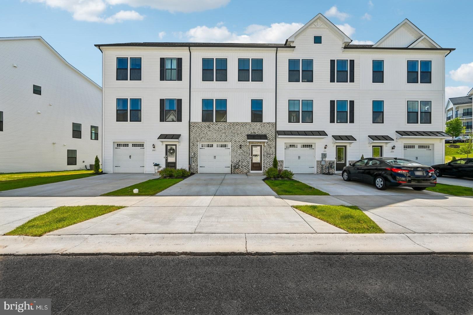 **OFFERING UP TO $15,000 IN CLOSING COST ASSISTANCE WITH USE OF APPROVED LENDER AND TITLE.**
MOVE-IN READY! The only brand new garage townhomes featuring exquisite Modern Farmhouse exteriors! Welcome home to Tuscarora Creek offering gorgeous luxury townhomes within 15 minutes of downtown Frederick, but tucked in the rolling hills and tranquility of this sought after area. Enjoy mountain views and wooded forest conservation spaces. Modern, open concept townhome with over 1900 of luxurious sq ft including 4 bedrooms and 3 full, 1 half baths, finished lower rec and a 1 car garage with a wide driveway.