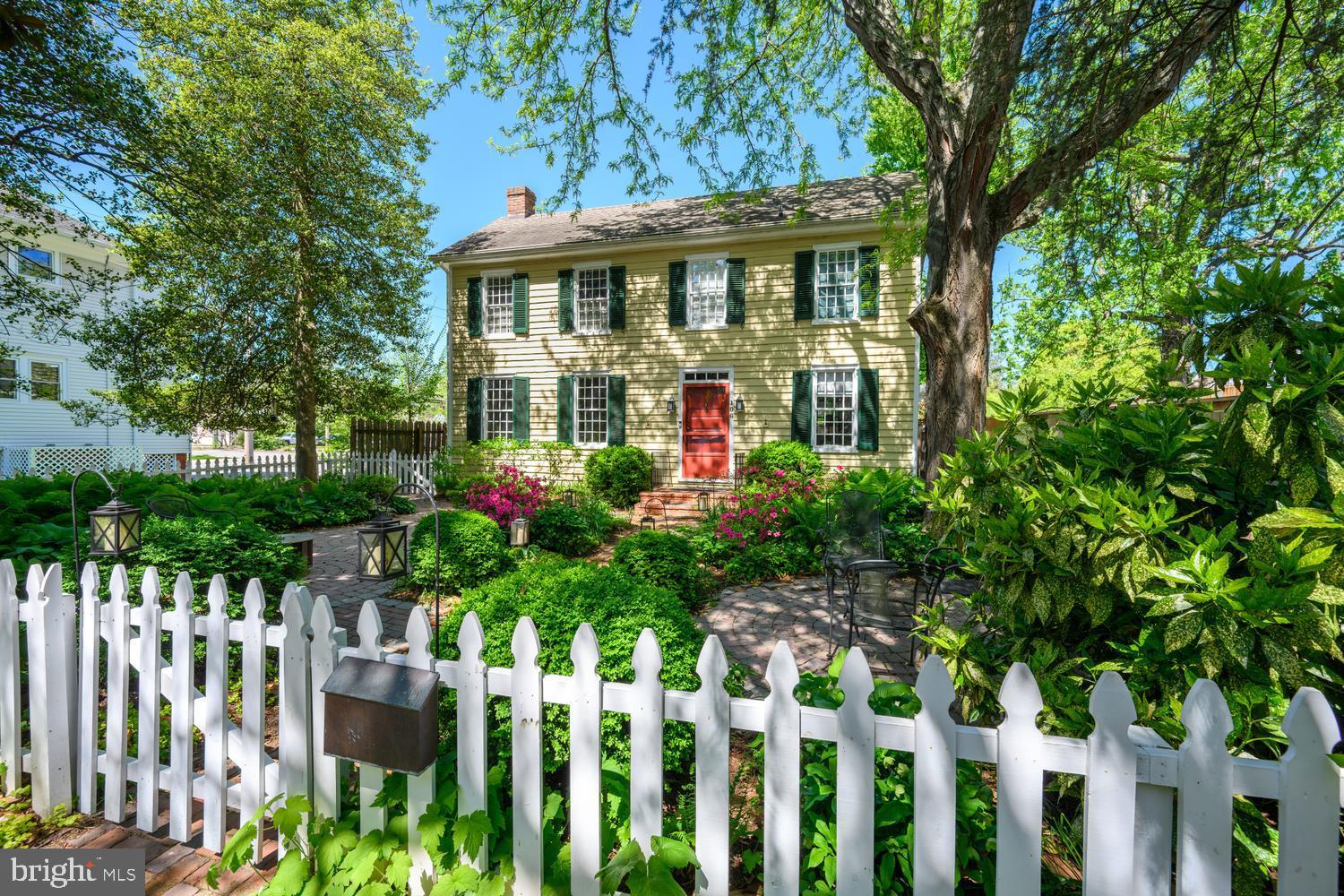 New photos just added—capturing the truly one-of-a-kind gardens now in full bloom! This is a property you need to experience in person to fully appreciate the timeless character and breathtaking setting of this remarkable legacy home. The Bedingfield Hands House, circa 1750, traces its roots back to pre-revolutionary times and has a story to tell. One of the few downtown homes to offer a large front courtyard, the property features beautifully landscaped gardens and a mature magnolia tree creating a private and welcoming outdoor retreat. 

Offering approximately 2,472 square feet, the home includes three generously sized bedrooms and three-and-a-half updated bathrooms with elegant details throughout, including crown moulding, original wide-plank hardwood floors, and timeless architectural charm. Major renovations completed in the 1950s —include a kitchen, laundry room, and baths—while preserving the home’s historic integrity. Central heating and air conditioning provide comfortable modern living within this classic setting. The property is also one of the few downtown homes to include a garage.

Currently operating as one of the most successful Airbnbs in the area with a strong rental history ($32K  in bookings last year!), this property offers the best of both worlds—an ideal vacation home and a turn-key income-producing investment. Furniture is negotiable.

Ideally located in the heart of Chestertown’s historic district, the home is just steps from art galleries, gift shops, the local farmers market, and beloved annual events like the Chestertown Tea Party Festival, Downrigging Weekend, and the Dickens of a Christmas. The Chester River located just down the street offers endless opportunities for boating and waterfront recreation, while the town itself maintains a relaxed pace of life where history, culture, and community come together.

A rare and remarkable offering, the Bedingfield Hands House now stands ready for its next owner to continue its story—preserving its past, enjoying its present, and carrying its legacy forward for generations to come.