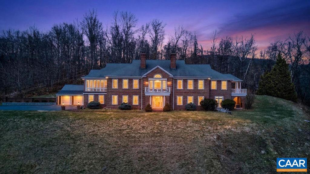 Experience 100-mile panoramic views from this mountaintop retreat in the heart of beautiful Nelson County. Situated on 33 private, secluded acres, this exceptional property offers the perfect balance of tranquility and convenience?just minutes from Wintergreen Resort and Devils Backbone Brewing Company.  This custom-built home spans over 4,000 square feet and is thoughtfully designed for both comfort and entertaining. The home features 3 bedrooms and 3 bathrooms, each with breathtaking views. The spacious open-concept kitchen includes a walk-in pantry and flows seamlessly into a formal dining room, ideal for hosting family and guests.  The primary suite is a private retreat complete with a dedicated workout studio and an oversized bathroom featuring a full-size hot tub.  The lower level offers more than 1,000 square feet of additional space, complete with large windows and a fireplace?perfect for creating additional bedrooms, a recreation area, or a home theater.  Additional highlights include:Three-car garage, Four fireplaces,Whole-house generator, Expansive patio ideal for sunset cocktails, Large private pond Unmatched privacy with no neighboring homes in sight,Granite Counter,Wood Cabinets,Fireplace in Great Room,Fireplace in Home Office,Fireplace in Kitchen