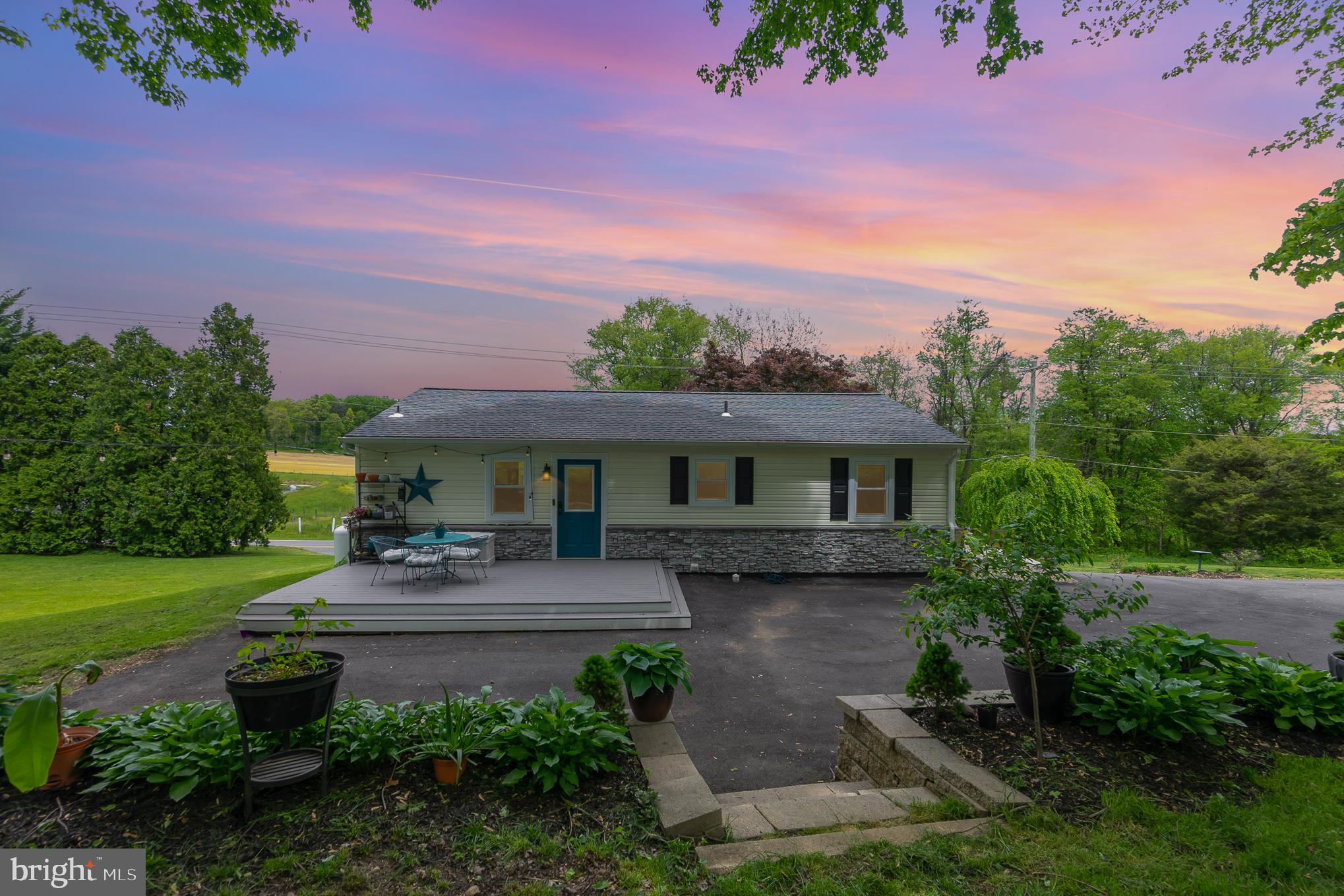 DREAM BIG!

Tucked into the quiet charm of Rising Sun sits a rancher that feels like the kind of home where mornings start slowly on the trex front porch with coffee in hand and evenings end under orange sunsets and quiet. 

This thoughtfully updated 2-bedroom, 1 full bath home rests on a rare combined double lot, offering a little extra breathing room that’s becoming harder and harder to find. Inside, the upgraded kitchen shines with granite countertops, blending modern touches with the warm, grounded comfort that makes a house feel like home.  Oh, and don't forget there's an R/O system under the kitchen sink.

The bathroom has been beautifully refreshed with dual vanities and a tiled glass shower enclosure that adds just the right amount of everyday luxury. Downstairs, the unfinished basement waits patiently for your imagination... workshop, gym, hobby space, storage, or future expansion. 

Out back, a large connex container provides substantial storage space for tools, toys, equipment, or weekend projects, while the expansive yard offers room to garden, entertain, or simply enjoy the open air.

Behind the curb appeal and cozy character are practical upgrades that matter, including a tankless water heater powered by an owned propane tank for efficiency and convenience. This is the kind of property that doesn’t try too hard to impress you... it simply welcomes you in and quietly makes you want to stay awhile.  Schedule your tour now before this one is long gone!!