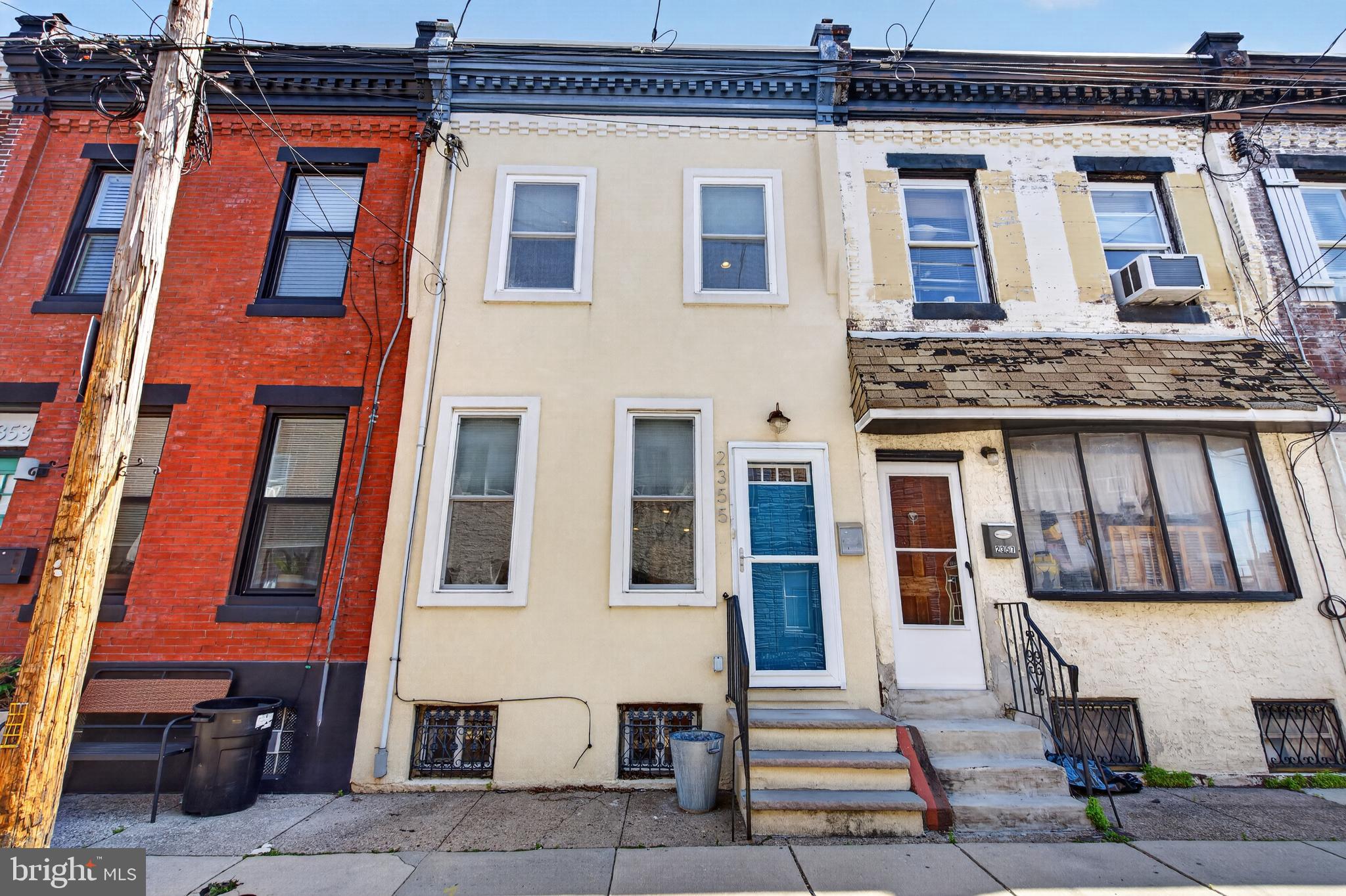 Welcome to this beautifully maintained Fishtown home set on a welcoming block. This warm and stylish residence effortlessly combines timeless character with thoughtful modern updates. Step inside to an open, sun-drenched main level where rich hardwood floors, elegant crown molding, and classic chair rail details create an inviting space perfect for everyday living and entertaining. The kitchen is truly the heart of the home, featuring eye-catching hex tile flooring, stainless steel appliances, cherry wood cabinetry, stone countertops, and a sleek glass tile backsplash. Just beyond, a private patio offers the perfect retreat for morning coffee or evening gatherings. Upstairs, you’ll find two well-sized bedrooms and two full bathrooms, including a peaceful primary suite complete with a built-in closet and en-suite bath. A finished basement with laundry, central air, and recessed lighting adds comfort and versatility to the home. Ideally located near I-95 and multiple public transit options, you’re just moments from everything Fishtown has to offer. This is city living at its best - schedule your showing today and experience it for yourself.