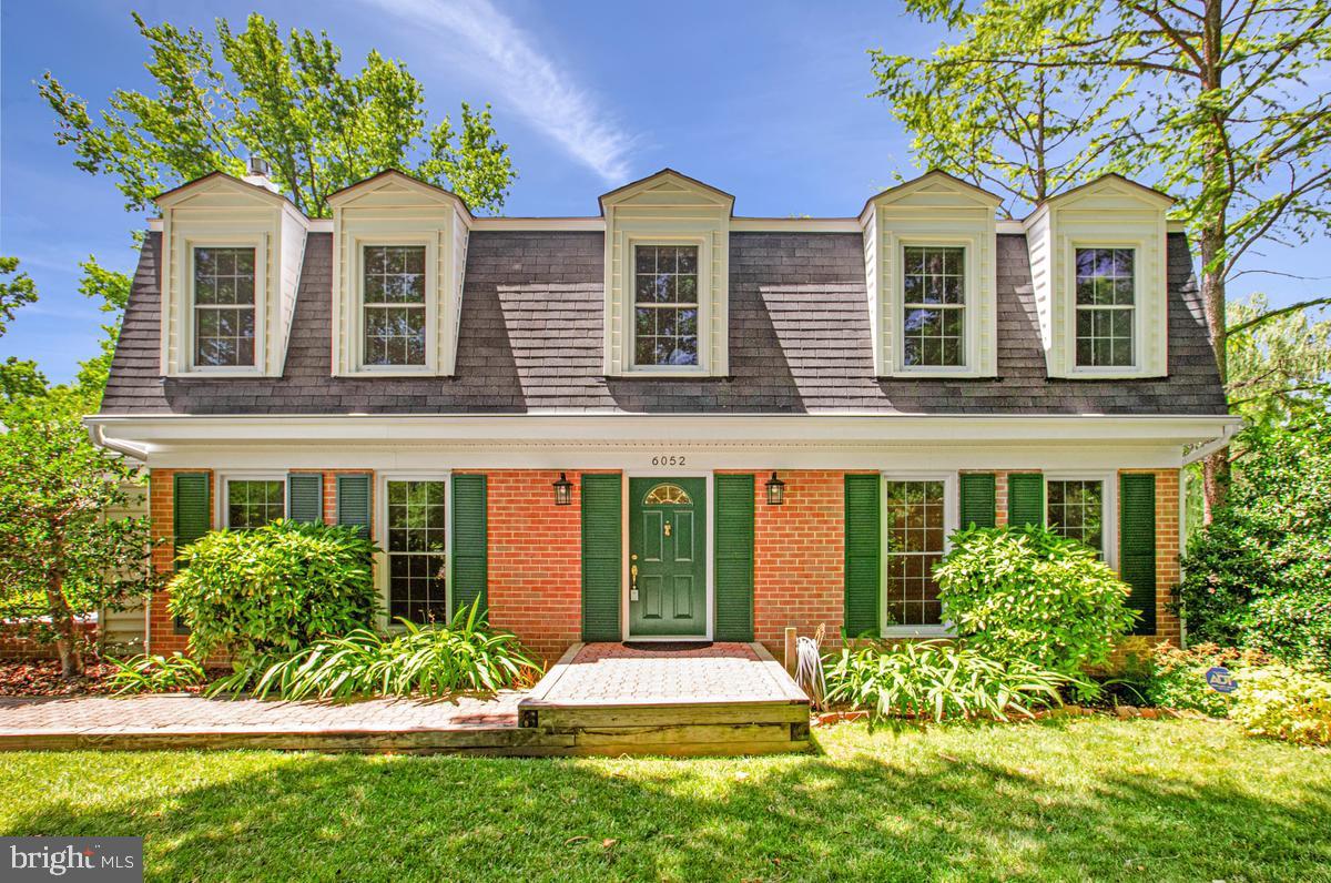 Cherish living in vibrant and exciting Columbia, where swimming pools, parks, walking paths, open space, lakes, restaurants, shopping, and Downtown Columbia's endless dining, entertainment, and cultural attractions are all just moments away. Lovingly maintained and truly move-in ready, this exceptional home offers the perfect blend of comfort, functionality, and gathering spaces. At its heart is a custom island kitchen featuring warm maple cabinetry, a quiet Bosch dishwasher, premium Thermador wall oven, warming drawer, and built-in microwave. The kitchen flows seamlessly into a stunning sunroom addition flooded with natural light and overlooking the gardens, patio, and play yard—an ideal setting for morning coffee or evening relaxation. The main level also features a welcoming family room with a cozy gas fireplace, along with spacious living and dining rooms designed for hosting gatherings with  family and friends. A convenient main-level laundry room is located in the mudroom off of the kitchen area, while the carport offers built-in storage and protection from the elements for both vehicles and outdoor equipment.
Upstairs, you'll find four generously sized bedrooms, all with ceiling fans, two full baths, and thoughtfully designed closet space that provides exceptional everyday storage. The finished lower level expands your living space with a large recreation room perfect for hobbies, crafts, movie nights, game days, or casual gatherings, plus abundant unfinished storage space to keep everything organized. This is a wonderful opportunity to enjoy a move-in-ready home in a desirable and amenity-rich location!