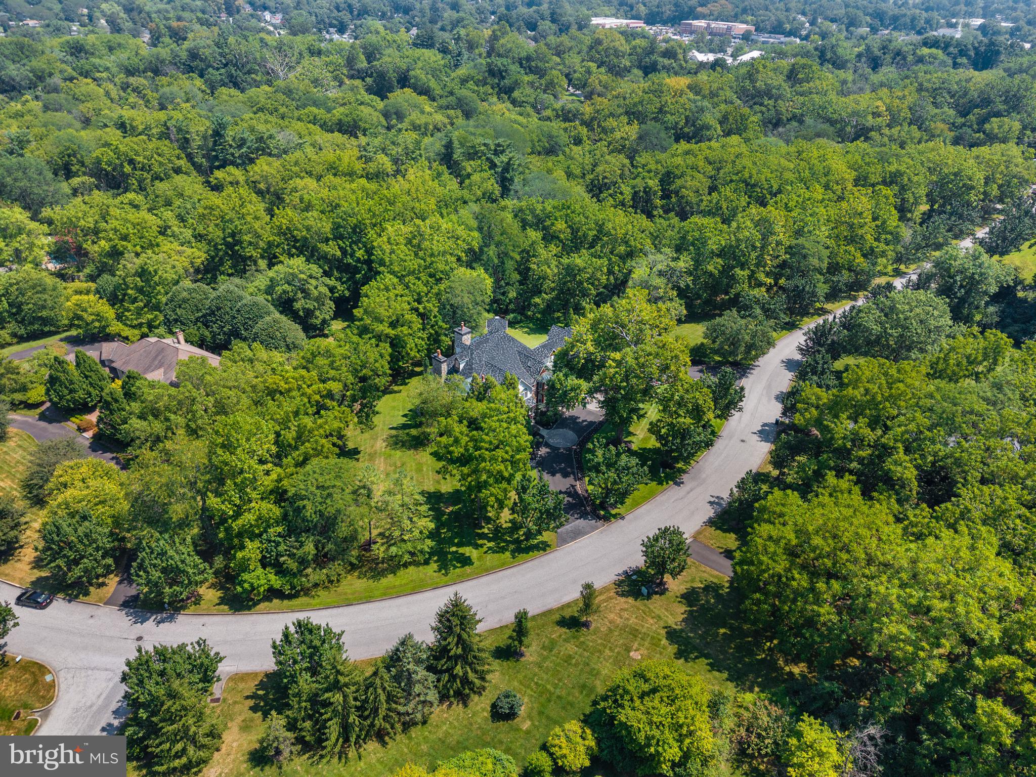 Amazing Custom Built, Move-In Condition, 8,000 SF Luxury Private Estate, Great For Relocation Buyer; Backs Up to Fort Washington State Park, a Block From Philadelphia Cricket Club, 5 Mins From Turnpike, Shopping, Dining & 25 Mins to Downtown; Located in Country Club Estates, Click on Video Button; Home Offers a Rare Combination of Location & Lifestyle; Designed For Entertaining, Everyday Luxury, and True Staycation Living; Features Include a Separate Wing In-Law Suite with Private Entrance & Garage Parking, Elevator Servicing 3 Floors, Indoor Koi Pond w/Waterfall That Acts as a Whole House Humidifier, Fully Equiped Gym, Infrared 2 Person Sauna, Golf Simulator & Net, Whole House Generator, First Floor Office/Bedroom, 5/6 Bedrooms, 6 Full Baths, HVACs with Individual Thermostats, 5 Fireplaces, Soaring Ceilings, TreeHouse with Jacuzzi, 3 Car Garage with 2-Story Ceiling, Freshly Painted, Stunning Hardwood & Marble Floors, a Large Walk up Attic w/Cathedral Ceiling, Abundant Storage, Recessed Lighting, Luxury Finishs and Much More; Dramatic Open Floor Plan with Large Walls of Windows, Beautiful Natural Light, and Exceptional Construction Throughout; The Grand Foyer with Marble Floors was Built For Large Parties, Steel-Beam Support That Allows the Space to Function as a True Dance Floor or Entertainment Area; Building Plan & Photos Available; Custom Built Floating Staircase to Second Floor, Floats Above the Indoor Koi Pond, Creating One of The Home’s Most Memorable Architectural Moments; Main Level Includes a Private Office/Bedroom/Living Room with French Doors, Marble Floor-to-Ceiling Fireplace, Newly Refinished Hardwood Floors, and Access to a Full Bath w/Shower; Formal Dining Room Offers French Doors, Hardwood Floors & Swing Door to Butler Pantry/Kitchen; Spectacular Family Rm Features a 25-Foot Hand Crafted Coffered Ceiling, a Floor-To-Ceiling Stone Wood-Burning Fireplace, Built-In Bar & TV, and a Full Wall of French Doors Opening to a Large Deck Overlooking the Wooded Grounds; Outstanding Gourmet Eat-In Kitchen, Built For Serious Entertaining, with Gas Marble Surround Fireplace, 2 Islands, Pendant Lighting, Generous Seating, a Jennair Cooktop with Grill, 2 Ovens, 2 Dishwashers, Microwave, Warming Drawer, a Refrigerator and a Freezer, a Small Beverage Fridge, Tons of Cabinets, Exit to Covered Deck; Butler Pantry with Built-in Wine Fridge, a Large Walk-In Pantry & a Utility Closet w/Sink & Side Entrance to Breezway; Second Floor Offers a Luxurious Primary Suite with Sitting Area, Gas Fireplace, Surround Sound, New Carpeting, and a Spacious His/Her Closet w/Built-ins; Spa Like Primary Bath with Large Double Sink Granite Vanity, Marble Floors, Private Commode Area and a 13 Ft Shower with 4 Shower Heads; Bathroom Extends to a Tree House with Lighted Block Floors, Sliders, Jacuzzi, Fireplace & Tons Of Windows Overlooking Park…Feels Like You are Outside! Second Floor Laundry Room with Tons of Cabinets, Clothes Line & Cabinet with Sink; Guest Bedroom w/Private Bath; Two Oversized Bedrooms, One with Loft Area, Share a Large Bath with Double Sink Vanity and Private Commode; A Separate Wing Houses the In-Law Suite/Apartment with a Full Bath, Closets, Kitchenette, Access to the Laundry Room, Great For Multi-Generational Families, with a Private Entrance and a Garage Bay, Plus 2 Balconies For Relaxing; The Lower Level Offers a Large Playroom, a Full Gym, a Golf Simulator, Infrared Sauna, Full Bath, Abundant Storage, Utilities, And Access to the Outside Paver Patio; This Home is For Families, Golfers, Athletes and Anyone Who Likes to Entertain and Wants the Opportunity to Own a One-Of-A-Kind Lifestyle Home; It is Not a Traditional Home, it is a Private Retreat, an Entertainer’s Dream, and a Rare Opportunity to Own a Custom Estate-Style Property in One of the Most Convenient And Desirable Locations in the Area; Pre-inspection Report Available; Don’t Miss Out on This Beauty! See Docs For Detailed Features Brochure & Home’s Story;
