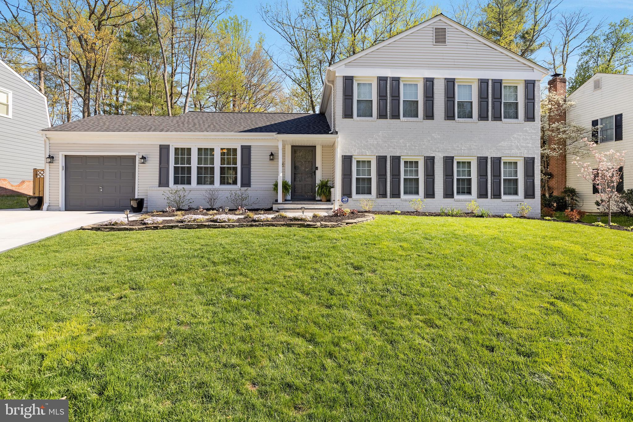 Welcome to 8527 Etta Drive – A Beautifully Updated four levelHome in the Heart of West Springfield's Keene Mill Station

Nestled in the highly sought-after Keene Mill Station community, this meticulously maintained home offers over 2,800 square feet of bright, open living space designed for comfort and everyday enjoyment. From the moment you arrive, you'll be welcomed by stunning front landscaping that adds curb appeal and sets the tone for the beauty within.
Inside, the main level features gleaming hardwood floors, a spacious living room with picturesque views of the backyard, and a formal dining area that opens through double glass doors to a private outdoor space—perfect for entertaining. The eat-in kitchen is well-appointed with white appliances, a generous pantry, and ample cabinet and counter space to meet all your culinary needs.
Upstairs, you’ll find four well-sized bedrooms with brand-new hardwood floors, including an expansive primary suite. This tranquil retreat offers abundant closet space and a beautifully renovated en-suite bath with double vanities and a spa-like shower. Three additional bedrooms and an updated full bath complete the upper level.

The lower level continues to impress with a large family room anchored by a cozy gas fireplace and more gleaming hardwood floors. A versatile fifth bedroom on this level makes an ideal office, craft room, or in-law/au pair suite, complete with its own renovated full bath. The luxurious laundry room is a standout feature, offering built-in cabinetry and a designated folding area that makes chores feel effortless.

The finished basement includes a generous recreation room with lots of storage space and a wet bar—perfect for movie nights or hosting friends and family.
Out back, enjoy a fully fenced-in yard with two flat areas, ideal for play, gardening, or simply relaxing outdoors. Two gates—one on each side of the home—add ease and functionality, while a large shed provides extra storage for tools and lawn equipment.
Additional features and recent updates include:New roof and gutters (2024), Newer windows and doors, Updated interior doors and hardware, Extended one-car garage—extra-deep for all your storage needs.

Ideally located near schools, parks, shops, and commuter routes, this home truly has it all. Don’t miss the opportunity to make 8527 Etta Drive your forever home. Situated on a idyllic street, this home offers exceptional commuter convenience with a nearby park-and-ride lot, express bus service to the Pentagon, and easy access to Franconia-Springfield Metro, VRE, and major routes like Fairfax County Parkway, I-95, I-395, and I-495. You'll appreciate the top-rated schools in the area, including Hunt Valley Elementary (within walking distance), as well as Irving Middle and West Springfield High Schools. Enjoy nearby recreational amenities such as Burke Lake Park, Lake Accotink, Pohick Regional Library, and South Run Rec Center, along with access to wooded walking and biking trails at Hidden Pond. Shopping and dining options abound with Lidl, Trader Joe's, Whole Foods, Safeway, Giant, and numerous restaurants just minutes away. Pool memberships are available at Hunt Valley Pool, Orange Hunt, or Rolling Valley. Best of all, there’s no HOA. This exceptional home is ready for you to make it your own—schedule a showing today!