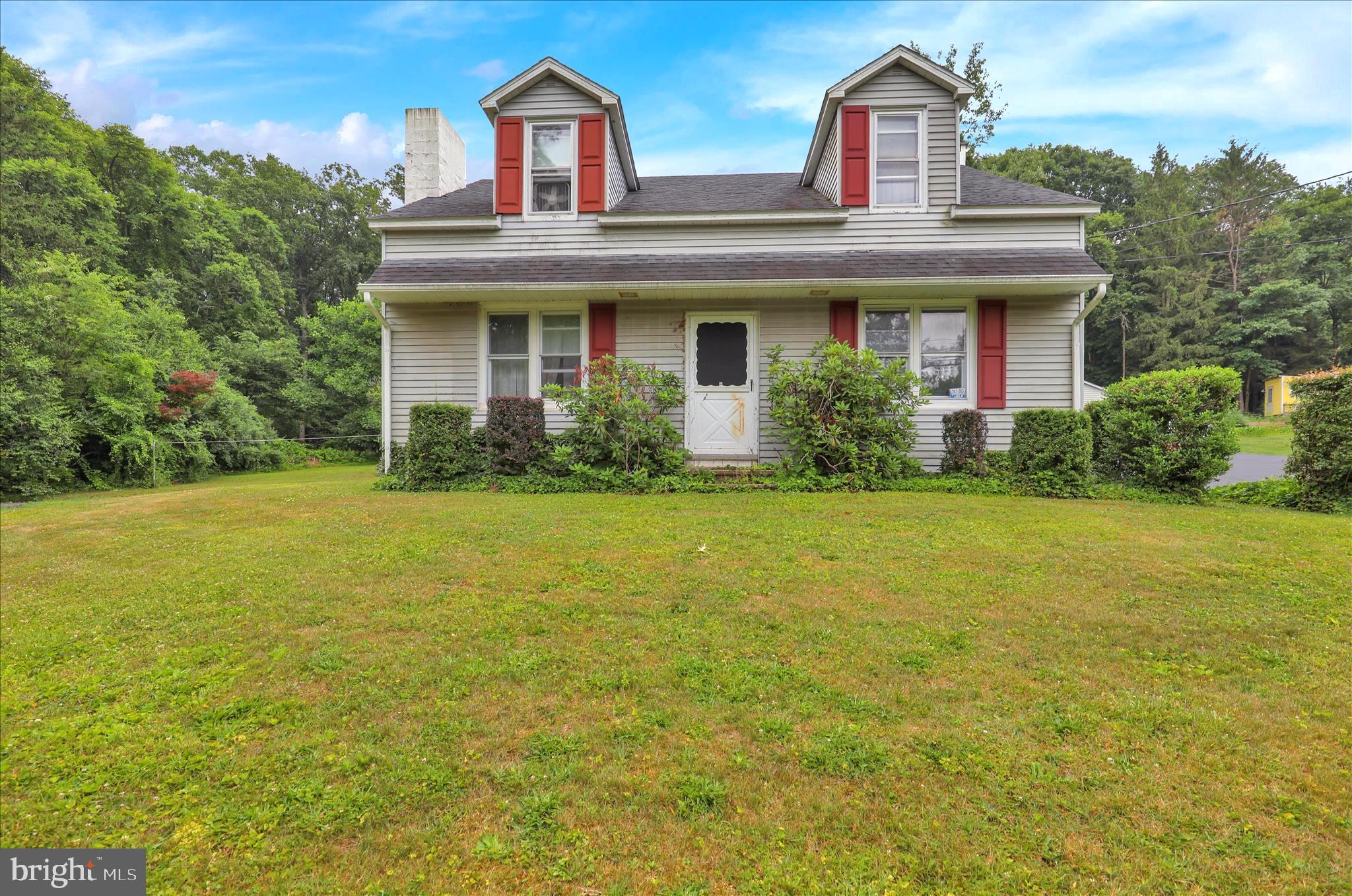 Investor opportunity with endless potential on over 2 scenic acres. This spacious Cape Cod offers a solid footprint with generously sized rooms, 3 bedrooms, and 1 full bath, providing the perfect canvas for renovation. A detached 2 car garage adds additional functionality and storage space. Surrounded by picturesque countryside views, the property offers the rare combination of acreage, privacy, and opportunity. Whether you are an investor, contractor, or buyer looking to build equity, bring your vision and unlock the possibilities this property has to offer.