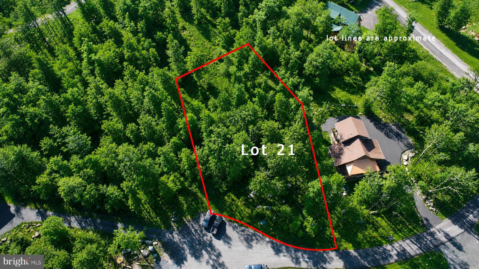 Located atop Wisp Resort in the desirable North Camp community, this .73-acre homesite offers the perfect setting for your future mountain retreat, full-time residence, or investment property. Surrounded by the natural beauty of Deep Creek Lake’s four-season recreation area, Lot 21 combines peaceful mountain living with convenient access to area amenities and outdoor adventure. The property features a gently positioned natural building site designed to capture scenic mountain views. Community infrastructure includes underground utilities along with public water and sewer availability, making it ready for your dream home plans. Outdoor enthusiasts will appreciate direct nearby access to Fork Run Recreation Area, offering miles of hiking and biking trails right from the community. Wisp Resort skiing, golf, mountain biking, dining, shopping, and Deep Creek Lake attractions are all just minutes away.