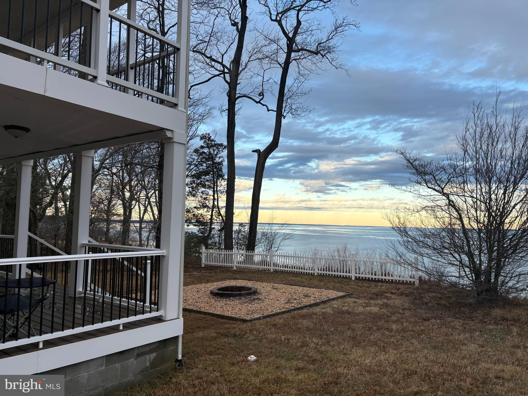 PRICE IMPROVEMENT!
<br><br>
🌊 Elevated Potomac River Retreat | Turnkey & Fully Furnished
<br><br>
Welcome to 1077 N Independence Dr, an elevated Potomac River retreat offering sweeping views, modern comfort, and exceptional flexibility as a personal escape or income-producing investment in Virginia’s Northern Neck.
<br><br>
Perched high above the river on a natural bluff, this home enjoys commanding, unobstructed water views and added privacy, with elevation that enhances both scenery and long-term peace of mind. Rather than sitting directly at the water’s edge, the setting provides a unique vantage point—delivering dramatic sunsets, passing sailboats, and panoramic river scenery that remains protected and undisturbed.
<br><br>
Inside, this 3-bedroom, 2-bath residence was completely reimagined in 2024 with a focus on smart use of space, functionality, and livability. The home was taken down to the studs, walls were reconfigured, and the kitchen and main-level bathroom were expanded to create a more open, usable layout that lives larger than expected. Every major component is brand new—roof, flooring, appliances, fixtures, bathrooms, and finishes throughout—resulting in a home that feels fresh, modern, and turnkey.
<br><br>
Large windows and seamless indoor–outdoor flow bring the riverfront lifestyle front and center. Multiple porches, a sun deck, and a fire pit seating area significantly extend the living space outdoors, making the home ideal for entertaining, relaxing, or simply enjoying the views and river breezes.
<br><br>
✨ What Makes This Property Stand Out
Elevated Bluff Setting: Dramatic, protected river views with added privacy and long-term vantage above the Potomac.
Efficient & Thoughtful Design: Renovated to maximize function and flow—perfect for buyers who value quality over excess square footage.
Fully Furnished & Turnkey: Move right in or launch a short-term rental immediately—furnishings convey.
Indoor–Outdoor Living: Multiple outdoor living areas expand usable space and enhance the lifestyle experience.
Community Amenities: Access to community beaches, marina, pool, clubhouse, and recreational facilities.
<br><br>
📈 Investor Appeal & Rental Demand
The Northern Neck continues to see strong demand for waterfront and water-view Airbnbs, particularly fully furnished, low-maintenance homes within a few hours of Washington, D.C., Northern Virginia, and Fredericksburg. This property’s views, condition, and turnkey nature make it especially attractive for short-term rental buyers seeking solid performance without the burden of major renovations.
<br><br>
💰 Unmatched Value on the Potomac
To truly appreciate the opportunity at 1077 N Independence Dr, consider the broader market context. Comparable riverfront or river-view properties along the Potomac in Northern Virginia—particularly in areas like McLean—regularly command $2M+ price points, often with less dramatic views and far higher density.
Here, you’re getting elevated, unobstructed panoramic Potomac views, a fully renovated and furnished home, and a turnkey lifestyle—all at a fraction of that cost. Simply put, this property delivers significantly more view, more privacy, and more lifestyle per dollar than nearly anything else on the river.
<br><br>
Whether you’re looking for a lock-and-leave second home, a stylish primary residence, or a high-demand short-term rental, 1077 N Independence Dr delivers an elevated river lifestyle that prioritizes views, experience, and simplicity... A value proposition that is exceptionally hard to replicate anywhere closer to D.C.
<br><br>
Come see why this setting, design, and location make all the difference—this isn’t about size, it’s about how it lives. 🌅