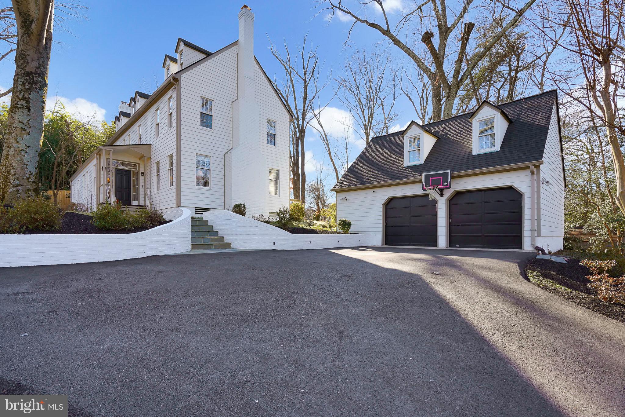 The weather has stopped us all! Please call listing agents for updates!
Located in exclusive Arcturus on the Potomac, this timeless masterpiece, with seasonal
views of the Potomac River on three levels, is a testament to the enduring power of
simplicity and function with spaces created to age gracefully and remain relevant
through the years. With thoughtful focus on the New Traditional Design aesthetic, the
original design aesthetic features of classic, high-quality and understated elegance have
been enhanced by the re-design in 2011 by international award-winning interior
designer, Darryl Carter. Once a part of George Washington’s farm, this private haven
includes only 15 homes. All built in different eras with lots of land and tall trees, Arcturus
on the Potomac has the extra benefit of sharing a private Potomac River waterfront
park.
With an eastern water view from the beautifully landscaped front yard and private rear
yard with retractable awning protecting the huge deck, one can enjoy nature and one’s
friends and family on the peaceful .7-acre lot. The multitude of upgrades and highlights
to the home include custom millwork and cabinetry – including recessed doors
throughout and an elegant staircase. Darryl Carter’s aesthetics include a signature living
room fireplace with stone-hearth treatment, built-in shelving with reclaimed wood and a
gorgeous library/dining room with an antique Swedish candle chandelier and reclaimed
wood ceiling beams. The family room seamlessly flows into the custom chef’s kitchen
with island featuring a unique retractable wood insert table. A convenient mudroom with built-in cabinetry and a powder room complete the picture. The bright lower-level family room leads to the
handsome new wine cellar of unfinished redwood featuring a 1230 bottle capacity,
countertop and self-contained cooling system.
The upper levels include a deluxe primary suite with large walk-in closet and a to-die-for
luxury bath as well as four additional large bedrooms serviced by two beautiful baths
and excessive closet space. There is a separate two-car garage with a large, finished
studio above for work, exercise or play!
This exceptional opportunity is located adjacent to the American Horticultural Society off
the scenic George Washington Parkway. Enjoy a myriad of exercise and recreational
activities as well as close proximity to Old Town, George Washington’s Mount Vernon
estate, National Harbor, Crystal City, Amazon’s HQ2 as well as Reagan National Airport,
Fort Belvoir, the Pentagon, Washington, DC and I495 and I95.  Note: Measurements may not be accurate.