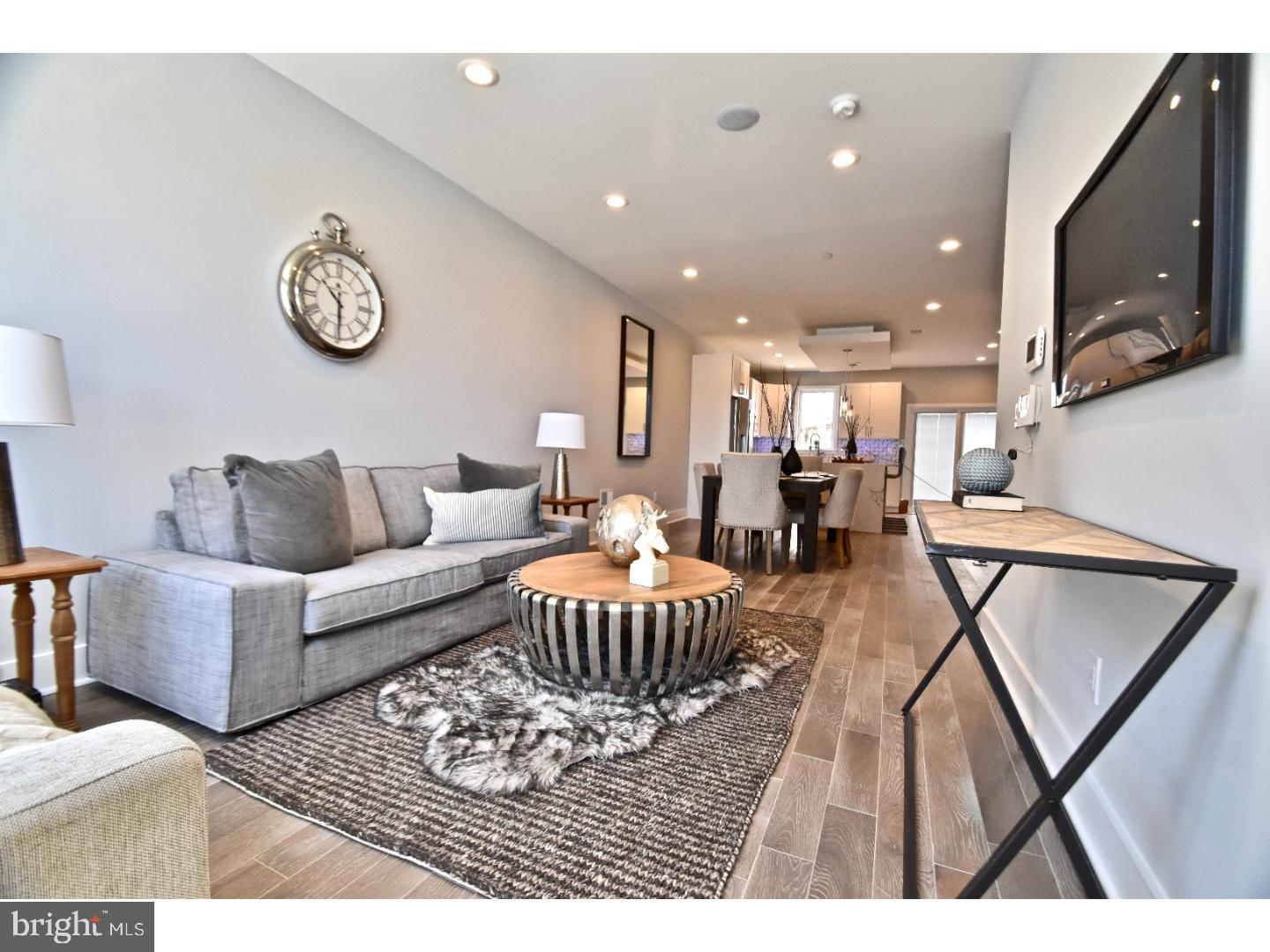 Welcome to 837 Moyer Street, a masterfully crafted & luxurious 3 bed, 3 full bath new construction home in red hot Fishtown! The first floor features a spacious and unique open concept layout with formal living room, dining area, and spacious kitchen with breakfast bar island, perfectly paired cabinetry & counter-tops, high end fixtures & finishes, as well as access to the rear cemented patio through sliding glass doors. The second level includes two generously-sized bedrooms with great closet space as well as a large full hall bath and super convenient & spacious laundry room with LG washer & dryer. The master suite is absolutely stunning and takes up the entire third floor. The bedroom is enormous, and has an equally impressive walk in closet. The in-suite bath includes stand alone soaking tub, twin sink vanity, and gigantic glass enclosed shower with seating. On to the roof deck, where you can take in captivating views of the city and surrounding neighborhood. The basement is fully finished and has a full bath, mechanicals, and plenty of space for storage. Very accessible to public transportation and major roadways. Centrally located and near to all the great shopping, dining, and nightlife the neighborhood has to offer. We welcome your visit today!