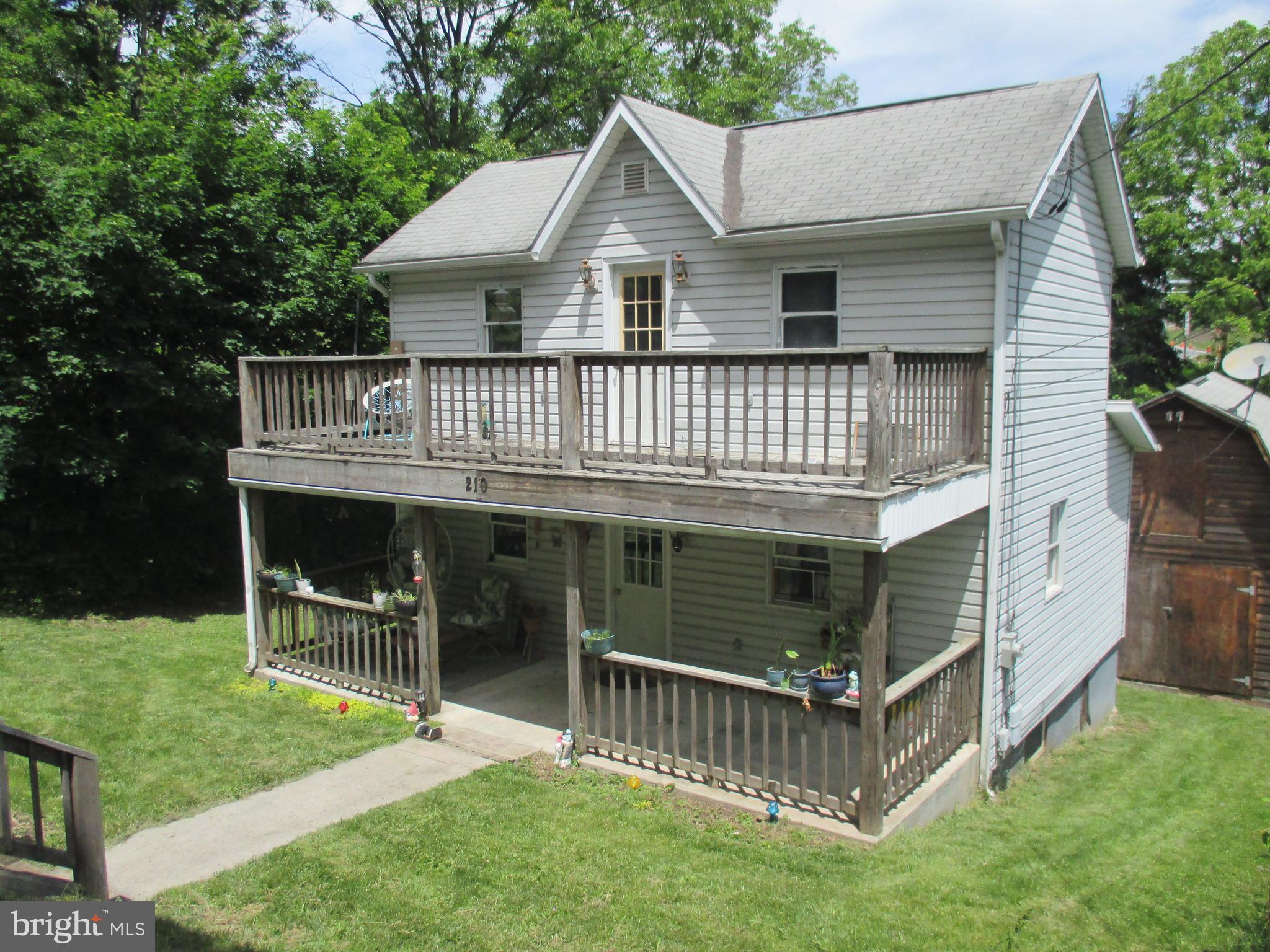 VERY WELL KEPT 2 STORY COLONIAL NEAR CONSTITUTION PARK AND UPMC. THE CHARMING FLOOR PLAN HAS 2 BEDROOMS AND A FULLY EQUIPPED KITCHEN. IT HAS A COVERED FRONT PORCH AND SECOND STORY BALCONY AS WELL AS A HUGE BARN STYLE SHED WITH ELECTRICITY. 
THERE IS A SMALL BABBLING BROOK AND A SECLUDED FIRE PIT FOR YOUR OUTDOOR PLEASURE. COME LOOK AT THIS HOME THAT IS PRICED FOR ANY BUDGET. !!!!UPDATE!!!! KITCHEN HAS BEEN NEWLY REMODELED AND NEW LAMINATE FLOORS IN THE MAIN LIVING AREA. .88 ACRE LOT ADJACENT TO THE HOME IS INCLUDED IN THE NEW PRICE AND OFFERS PLENTY OF ROOM TO BUILD A GARAGE, CARPORT, OR USE IT AS A PARKING AREA FOR THE HOME.