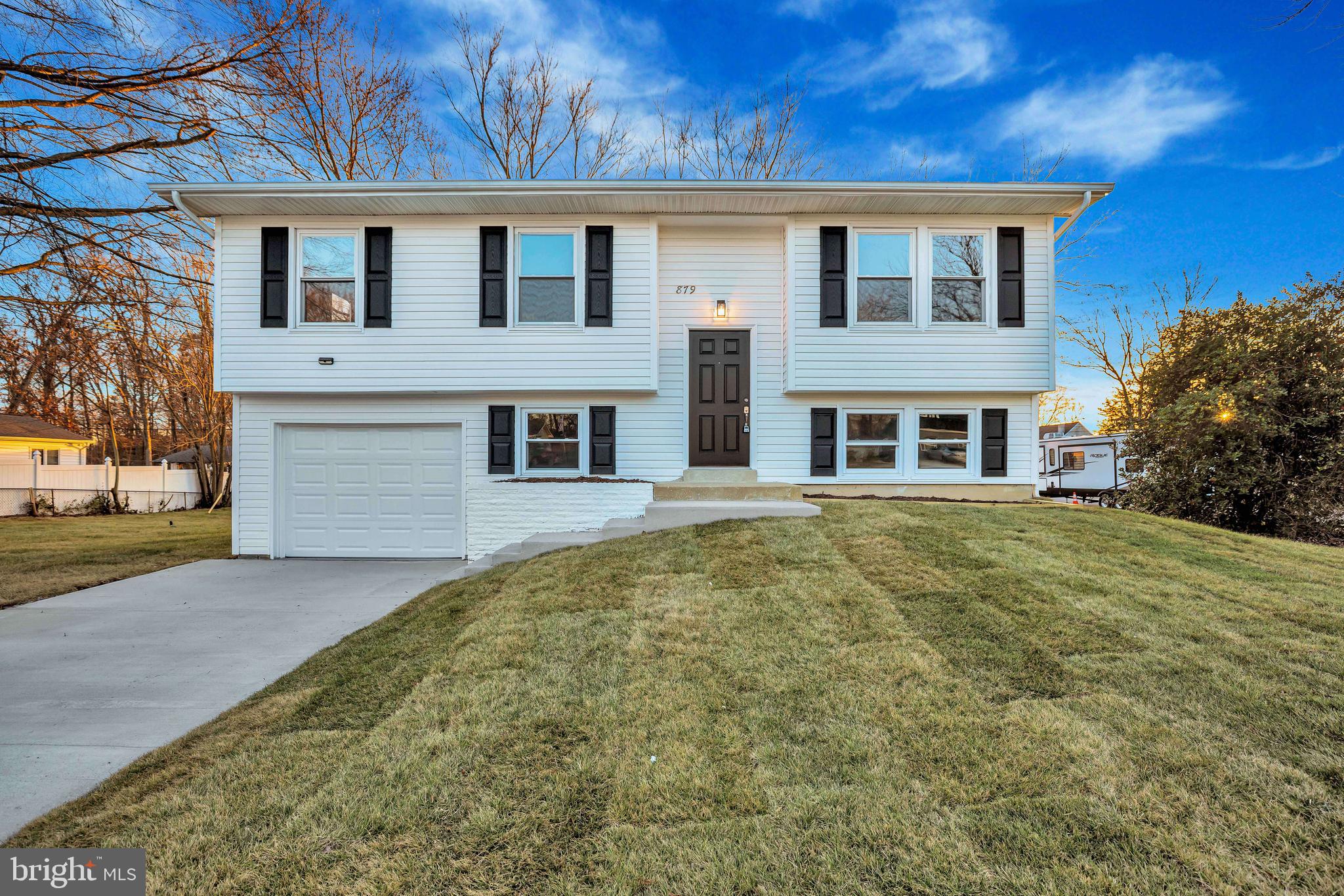 BACK ON THE MARKET!  THIS IS IT!  Fully renovated single-family home in St. Charles situated on a large corner lot. This open, split two-level residence features fresh paint throughout, new wood flooring, and new textured carpeting. The brand-new kitchen showcases custom cabinetry, luxurious Calacatta Laza quartz countertops, and new Samsung stainless steel appliances.  Every interior door has been replaced, along with a brand-new glass sliding door and a full-glass exterior door. The home has been completely updated electrically, including a new electrical panel, new outlets and switches, recessed lighting, and all new interior and exterior light fixtures.  Plumbing has been fully updated,  new sewer line, and a new water heater. Additional upgrades include recently replaced siding, all-new bathrooms, a new concrete driveway, and a new garage door.  Professionally landscaped with new sod.  Conveniently located just minutes from St. Charles Town Center.
