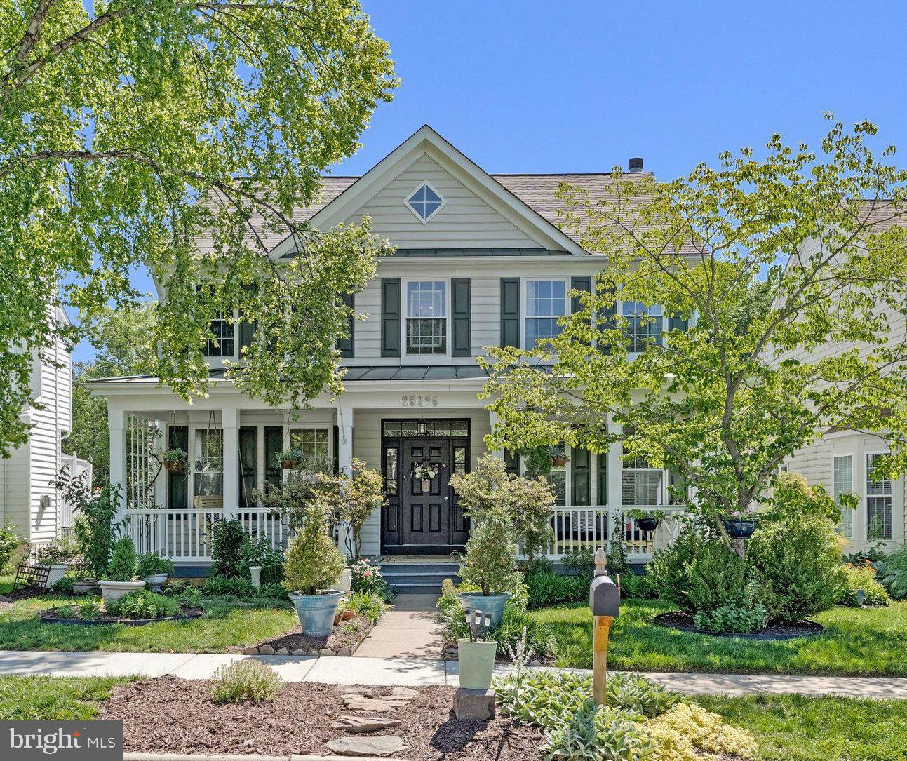 Tucked away on a quiet street in the heart of Chantilly, this beautifully updated 4-bedroom, 2 full bath, 2 half bath home offers the perfect balance of comfort, charm, and exceptional outdoor living. A welcoming front porch overlooks the grassy common area in front of the home, while the private backyard backs to woods, creating a peaceful and scenic setting.

Inside, you'll find hardwood floors throughout, an open and inviting floor plan, plantation shutters, and custom built-ins that add character and functionality. The updated kitchen serves as the heart of the home, featuring shaker-style cabinetry, quartz countertops, abundant workspace, and seamless flow into the living and dining areas—ideal for everyday living and entertaining. Just off the kitchen, a convenient mudroom/laundry room adds functionality and everyday ease.

The upper level features four spacious bedrooms, including a serene primary suite with vaulted ceilings and an updated en-suite bath complete with a soaking tub. The finished lower level provides additional flexible living space and a convenient half bath, perfect for a recreation room, media room, gym, or home office.

A true outdoor oasis awaits with the exceptional covered deck and entertainment space. Thoughtfully designed with Trex decking, architectural columns, a vaulted ceiling, ceiling fan, decorative lighting, and multiple seating areas, the space offers comfort and style in every season. Below, a custom stone patio and tranquil pond are surrounded by mature landscaping, creating a private retreat perfect for entertaining guests or simply unwinding while enjoying the wooded backdrop. 

Updates include: New Windows (2025), Trex Deck (2025),Quartz Countertops (2024), GE Cafe Appliances (2024), Primary Bathroom (2018),  Roof and Front Porch Metal Roof (2016).