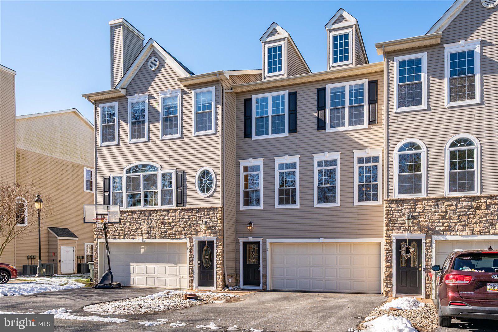 PRICE DROP: $399,900. THE BEST DEAL IN THE TOWNES OF BERLIN — PERIOD.

Instant equity? Yes, really. Similar homes here are listed for way more — this one's priced so you can make it yours (paint, updates, your vibe) and still come out ahead.

The layout flows easily: an entry-level flex room for your WFH setup, gym, or guest space — plus a half bath and walk-out patio. The main level is all open-concept — big living and dining space that flows into a large kitchen and breakfast nook with its own balcony and pond views.

Upstairs: a primary suite with a private balcony, walk-in closet, soaking tub, separate shower, and double vanity. Two more bedrooms, a full bath, and laundry where you actually need it. Storage everywhere, plus an oversized two-car garage.

Location? Walkable to downtown Berlin — award-winning restaurants, coffee, shops, parks, and festivals all year in one of America's Coolest Small Towns. Three outdoor spaces (two balconies + patio), all with pond views.

Saw this one before? Here's the real story: the days on market are no reflection of the seller or the property. The condo association has since completed major organizational and financial upgrades — more transparency, stronger oversight, zero guesswork. Now it's clear skies.

3 beds. 2 full + 2 half baths. 3 levels. $399,900 — and the sellers are including a one-year home warranty for extra peace of mind. This is the sign you've been waiting for — book your tour before someone else does.