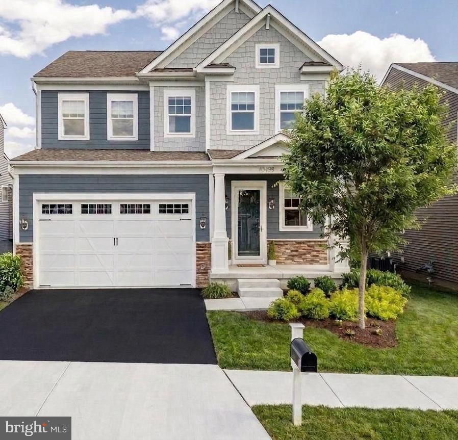 Welcome to this exceptional five-year young 4-bedroom, 3.5-bath single-family Stanley Martin-built home in the highly sought-after 55+ Retreat at Poland Hill community! This property has been meticulously maintained and lightly used.  Offering just under 4,000 square feet (plus 2 car garage with painted floor and walls) of beautifully upgraded living space, this home combines elegance, comfort, and modern convenience!

From the moment you enter, you’ll appreciate the stunning engineered hardwood flooring that extends throughout the main and upper levels. The gourmet kitchen is truly the heart of the home, featuring an expansive waterfall quartz island, stainless steel appliances, gas cooktop, generous pantry, and a stylish laundry room filled with natural light and abundant storage.

Designed for both everyday living and effortless entertaining, the open-concept floor plan flows seamlessly into the inviting living room, highlighted by a cozy gas fireplace. Step outside to the screened-in porch overlooking a peaceful treed lot and beautiful stone patio.  The gas grill has its own gas line for ease of grilling  — the perfect setting to relax with a glass of wine and enjoy the sunset!

The spacious main-level primary suite offers the ease of one-level living with a spa-inspired En-suite bath, featuring a large dual-sink vanity, beautifully tiled walk-in shower, private water closet and oversized walk-in closet.

Upstairs you will find a huge and versatile bonus/family room, two additional bedrooms and a full bath — ideal for a spacious guest area,  home office or additional living space!

Freshly painted lower level awaits with expansive family room, 4th legal bedroom, 3rd full bath , wet bar with under cabinet lighting, ample storage, and walk-out to the treed backyard oasis with the same custom stone patio.

Professional lawn care is included in the monthly HOA. The landscaping so lush, you have to see it! In addition, there is snow removal provided for both your driveway and walkway.

Endless updates throughout!  Full list of MANY updates included in uploaded documents and also printed at the  property.

This home is truly in like-new condition.  Nothing for you to do, but move in and enjoy Poland Hill!

Experience tranquil living in this premier active adult community offering exceptional amenities, including a clubhouse, fitness center, outdoor pool, and scenic walking paths. Conveniently located just minutes from South Riding, South Riding Golf Club, Loudoun County Parkway, Routes 50 and 28, along with premier shopping, dining, and entertainment.

Purchaser is required to pay a one-time capital contribution fee of  $500 to The Retreat at Poland Hill HOA and $1,000 to Poland Hill HOA at closing.