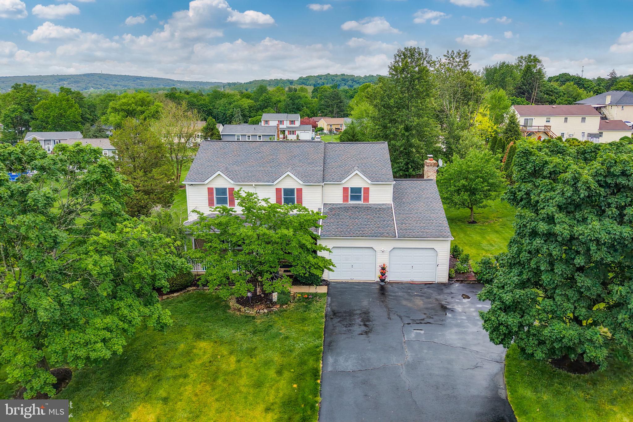 Welcome to this lovely 4 bedroom, 2.5 bath Colonial located in the highly sought after Southern Lehigh School District in Upper Saucon Township! Tucked away in a peaceful and charming neighborhood, this spacious home offers the perfect blend of comfort, charm, and convenience. Situated on an almost 1/2 acre lot, there is plenty of room to relax, entertain, and enjoy the outdoors, complete with an invisible dog fence and a BRAND NEW shed for additional storage. Step inside to find a warm and inviting layout featuring an eat-in kitchen, generously sized living spaces, and a cozy family room with a wood-burning fireplace perfect for chilly evenings. Several rooms have been freshly painted, giving the home a bright and refreshed feel throughout. The finished basement provides valuable additional living space ideal for a recreation room, home office, gym, or playroom and plenty of storage. Major updates offer peace of mind including a NEWER roof installed in 2019, NEWER Hot Water Heater replaced in 2024, and a NEW heating system in 2025. Central air keeps the home comfortable year-round, while the attached 2-car garage adds everyday convenience. Perfectly located close to Routes 78 and 309 for easy commuting, and just minutes from the Promenade Shops featuring numerous dining, shopping, and entertainment options. Don’t miss this wonderful opportunity to own a beautiful single home in one of the area’s most desirable locations!