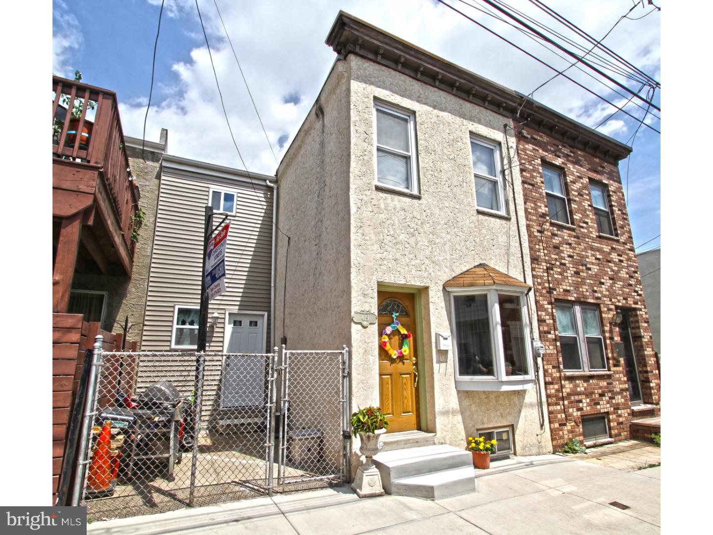 Take time to see this charming Fishtown 2 story, 2 bedroom home on Flora Street. Walk to your favorite restaurants and cafe's from this desired location. This adorable home has a unique L-shape foot print with a front courtyard patio that offers space for furnishings, a grill and planters. Enter in to an open layout with a formal living room that is filled with natural light through the bay window. There is a spacious dining room and beautiful renovated kitchen. The kitchen has 42" solid wood cabinets that are beautiful, and a peninsula bar that offers extra storage and work space. Appliances are included. There is access to the yard from the kitchen making grill to table top serving a breeze. The staircase that leads to the TALL basement and the 2nd floor is beautiful with iron railings and an open and airy feel. Full basement is great for storage but can be easily finished due to the high ceilings! The 2nd floor has 2 good size rooms with large closets. The hall bath is absolutely huge with a laundry room built in. Front load washer and dryer included. We welcome your visit today.