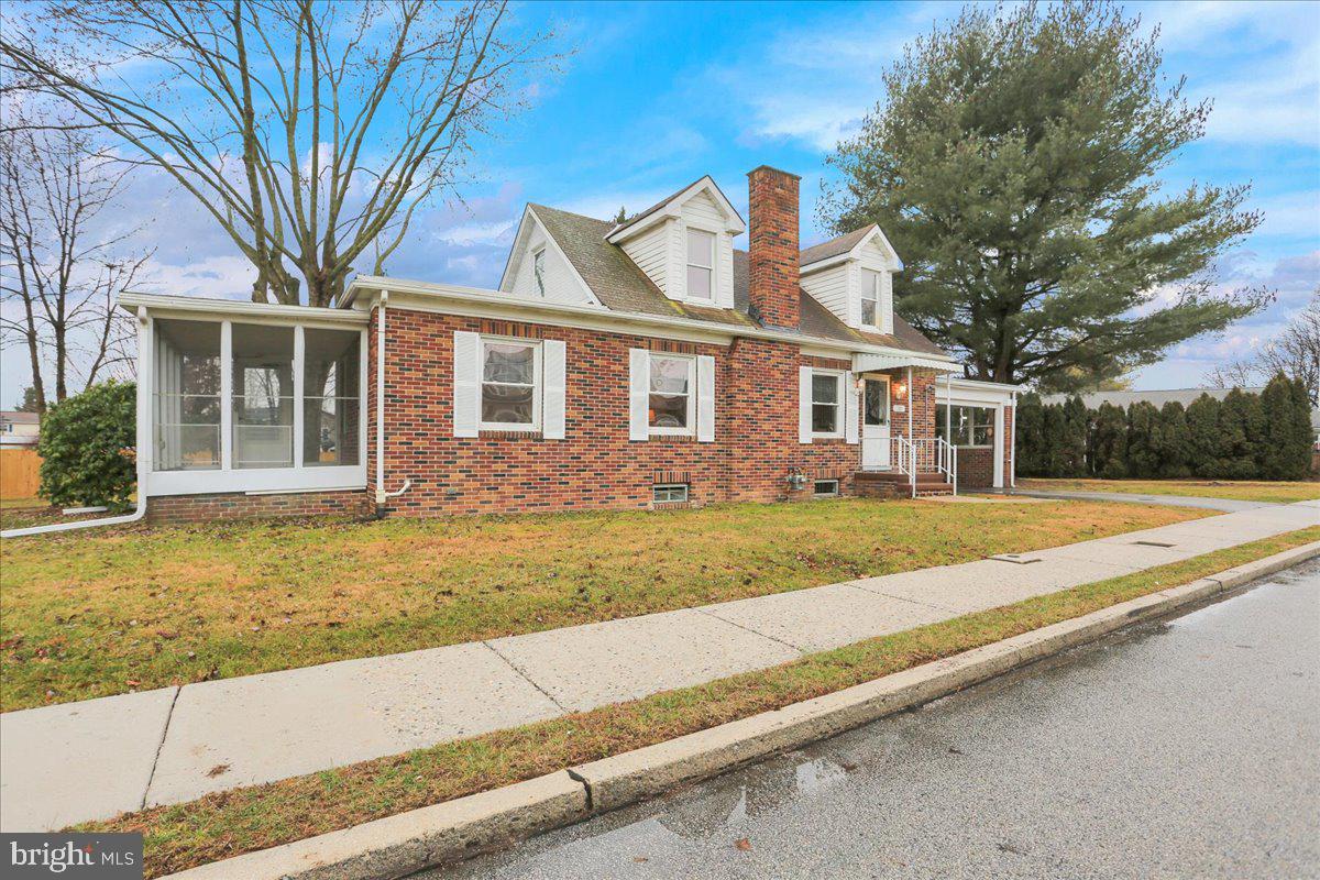 Beautifully remodeled by McManus Homes with attention to detail. This one and a half story home has spacious owners suites, on both the 1st and 2nd floor.   Each suite has a walk-in closet and a beautifully remodeled attached bath.  The first floor bath has a brand new tile shower.  The 2nd floor bath has a tub/shower.    Room to entertain with the large living room and dining room .  The brand new kitchen features white cabinets, stainless appliances, a pantry and ceramic tile floor.  The 3rd bedroom could be utilized in many ways, as a guest room, a den or an office.  It has an attached screened porch.  The home features original hardwood floors throughout most of the home.  The basement has an additional half bath.  You will appreciate the detached 2 car brick garage plus an attached carport.  The large deck offers plenty of space to entertain outdoors.    A portion of the large .6 acre corner lot is fenced.  Owner is a PA licensed realtor.