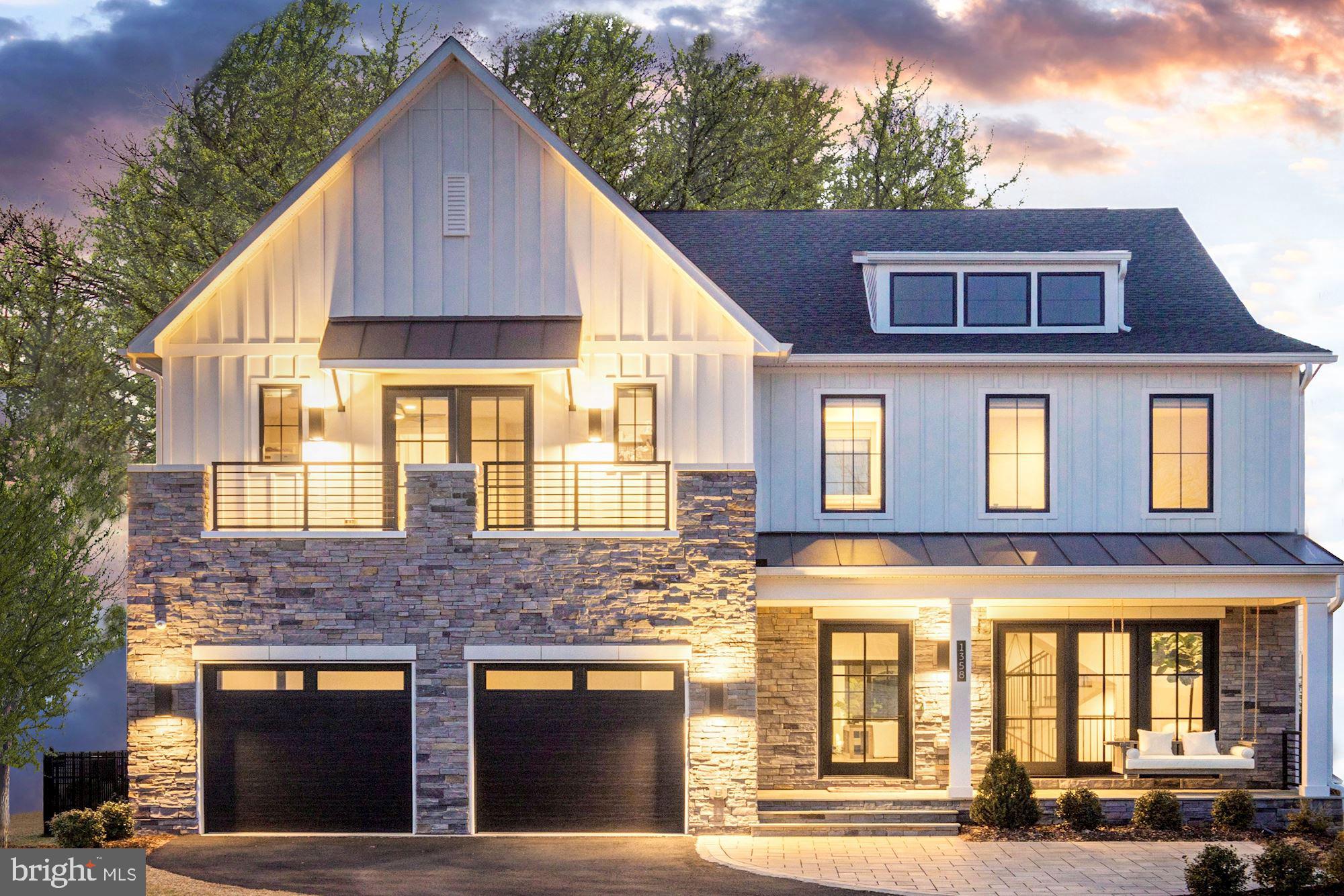 This two year old stunning Modern Farmhouse features the best in architectural features with custom curated finishes and designer appointments throughout the 8900 sf of living on four levels.  The spectacular open floor plan is highlighted by  a dramatic squared floating spiral staircase  and a grand foyer with views all the way to the backyard.  This luxury home, with top of the line finishes, is sited on a premium lot backing to trees with a fenced backyard with an expansive flagstone terrace with a fire pit and built-in grill.

Nothing was spared in the construction of the house which features hardwood floors throughout, oversized windows, 10' ceilings, three covered porches and custom designed systems in the bedroom closets and 1400 sf of outdoor living space.

The Main Level includes:  A Great Room with a 60 in linear gas fireplace and a 12 ft multi-panel pocket door opening to the porch allowing your entertainment space to transition from the inside to the outdoors   A well appointed gourmet kitchen with a sleek white on white look with quartz countertops and quartz backsplash has an amazing oversized center island with eat-up breakfast bar.  The kitchen is equipped with a Wolf range, 72" Subzero refrigerator and freezer, a dishwasher, three ovens and one microwave and a built-in Wolf coffeemaker with bean grinder   Adjoining the kitchen is a catering kitchen with a dishwasher and sink and large walk-in pantry and in addition there is a Butler's pantry with a sink and wine cooler   Conveniently located between the kitchen and mudroom is a communication nook with a built-in desk for dropping your keys and mail    The mudroom/laundry area has a built-in bench with cubbies overhead and underneath   The area is complete with a walk-in closet and linen closet    The Dining Room with a tray ceiling with accent lighting .

The Upper Level includes: A luxury owners suite has its own private covered porch, a spa-like marble bath with a large walk-in shower with a built-in bench and two doors and a show piece free standing soaking tub as well as dual vanities and a generous custom designed, walk-in closet with huge center island  and suitcase closet    Three en suites with walk-in closets of which the guest suite has it's own balcony   In addition this level features an open family room that includes a coffee bar with a refreshment refrigerator    Second laundry room.  

The Loft level includes: Fifth bedroom with full bath   Flex room or playroom with glass door to covered rooftop deck and open deck offering great vistas.

The Lower level includes: Ten foot ceilings and French doors to walkup stairs    Light filled expansive Recreation Room with wet bar equipped with dishwasher, refreshment refrigerator and sink enhanced by accent lighting    Six bedroom and full bath   Ballet / dance nook    Game room or play room    Exercise / Media Room    Under stair cubby for playing or storage.

The Retreat in McLean is in a very convenient location just minutes to Tysons, the Silver Line, 495 and the Toll Road as well as Tysons Mall, the Galleria, the Boro and the new performing Arts Center at Capital One Hall.  Monitor Lane is just blocks to the McLean Central Park, library and community center.  It is just minutes to Scotts Run Park and Great Falls National Park with paths for hiking or walking along the scenic Potomac River.  The location is equidistant to Reagan National and Dulles International Airports.