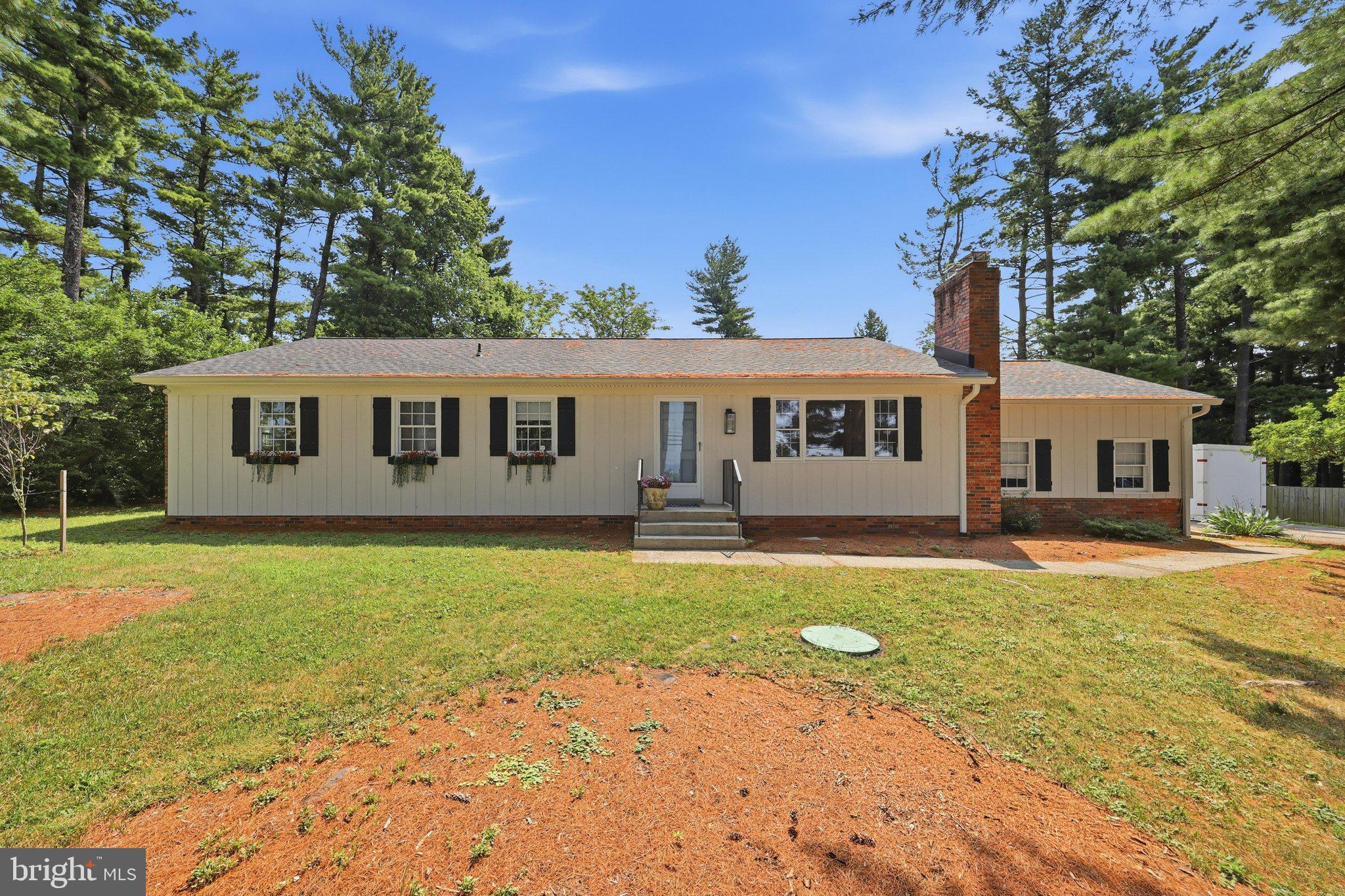 OPEN HOUSE ** July 18  Sat  1-3 PM-  Welcome Home Sweet Home-- Completely updated and move-in ready! This beautifully maintained 3BR, 2BA rancher offers over 3,000 sq. ft. on a level 0.71-acre lot with no HOA or covenants, just minutes from Frederick on "The Boulevard." The bright open floor plan features gleaming hardwood floors, fresh paint, abundant natural light, updated tile baths, quartz countertops, newer appliances, downdraft exhaust fan, pantry, and convenient main-level laundry.

The inviting family room features a wood-burning fireplace, while the full unfinished basement offers over 1,500 sq. ft. of additional space with new windows, a second wood-burning fireplace, and endless possibilities for future finished living space, recreation, workshop, or storage.

Enjoy outdoor living on the newer stamped concrete patio overlooking the spacious backyard. Additional features include an attached 2-car garage and numerous major updates for peace of mind: architectural roof (3 years old) with a 50-year warranty, new septic fields, distribution box and pump (2026), new washer and dryer (2026), new electrical panel (2024), UV water treatment system (2024), new well pump and pressure tank (2022), new garage door (2021), HVAC (approximately 10 years old and serviced annually), and hot water heater (approximately 10 years old).

This meticulously maintained home combines quality updates, generous living space, and an unbeatable location close to shopping, restaurants, parks, schools, and major commuter routes. Don't miss this exceptional opportunity!  This is a MUST SEE !!