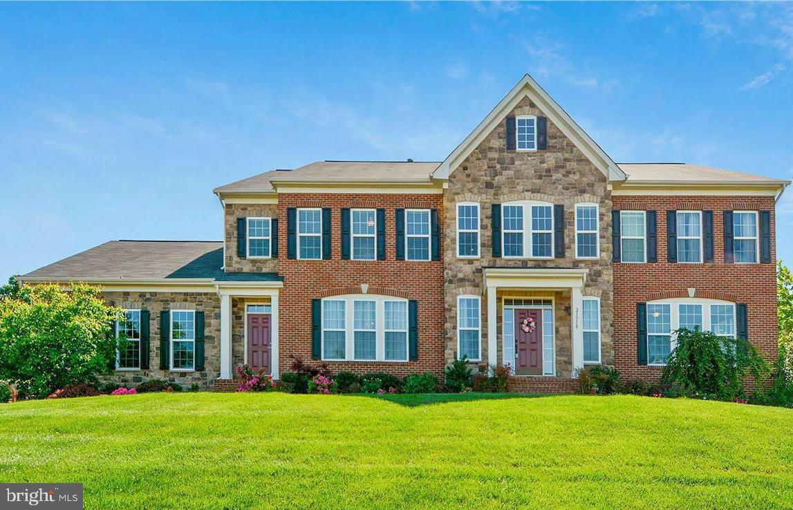 Impressive in both size and features, this Broadlands home offers over 7,300 square feet of finished living space on three levels, set on a 3/4 acre lot with a fenced backyard. Inside, a grand foyer welcomes you with hardwood floors, extensive moulding and fresh paint. The main level includes a spacious family room with gas fireplace, a private office (or potential 6th bedroom), and a gourmet kitchen with a large granite island, stainless steel appliances, double ovens and separate range, custom backsplash, and generous breakfast area. *** Upstairs you'll find new carpet (2025), a large laundry room, and four large bedrooms, each with its own full bath. The primary suite includes a coffered ceiling, recessed lighting, two walk in closets, and a luxury bath with dual water closets. *** The finished walk up lower level was fully renovated in 2019 and includes engineered hardwood flooring, coffered ceilings, a custom stone accent wall with fireplace, wet bar with granite and stainless appliances, a 5th full bath, dedicated home gym, spacious rec room, and a home theater with a retractable 120″ screen, Sony Atmos projector, audio system, sconces, and custom fish tank. A separate in law/au-pair suite includes a bedroom, living area, kitchen with granite and refrigerator, and 6th full bath. *** The side load 3 car garage is heated and cooled with recently installed MRCOOL system, epoxy floors, upgraded LiftMaster doors, overhead racks, and additional GFCI outlets.  *** The fully fenced backyard features a concrete pad and a Somerset 12×10 shed with workbench and electricity, and offers ample space to create your own backyard oasis—perfect for a pool, patio, or garden.  *** Recent updates include: roof (Timberline Ultra HD, 2018), hardwoods (2024), carpet (2025), and fresh interior paint (2025). *** Welcome to Broadlands, one of Loudoun County’s most sought after communities. Designed around Stream Valley Park’s 150+ acres of trails, wetlands and wildlife preserves, this master planned neighborhood blends natural beauty with easy access to shopping, dining, top rated schools, award winning golf courses and convenient commuter routes. Located just 4 minutes from Ashburn Metro, 15 minutes to Dulles Airport, and 35 minutes to Washington, D.C. Minutes from new Ashburn Recreation Center which features a 50-meter competition pool, a leisure pool, a spa, the largest full-size gymnasium in the PRCS system, a sensory room, a multipurpose room with a teaching kitchen, classrooms, offices, and meeting spaces. The facility's one indoor basketball gymnasium has twelve basketball hoops and includes game line markings for basketball, badminton, pickleball, and volleyball. The second floor will consist of fitness areas, a running track, spectator seating for the competition pool, and a viewing area for the leisure pool.***Community Amenities: Residents enjoy 3 community pools, a fully outfitted fitness center, tennis/pickleball courts and Broadlands Live – a family friendly summer concert series. The Broadlands Nature Center and rental-ready Community Center provide nature programs, events and gathering space.  The community is connected by miles of walking and biking trails weaving through wetlands and preserves, with tot lots and parks located throughout the neighborhood. *** Loudoun County is also known for its award winning wineries, craft breweries, and scenic outdoor spaces. Explore the LoCo Ale Trail or enjoy a day at local favorites like Stone Tower Winery and Dirt Farm Brewing. Outdoor lovers will appreciate nearby access to the W&OD Trail, Red Rock Wilderness Overlook, Beaverdam Reservoir, and other regional parks offering hiking, biking, fishing, and kayaking. *** This home offers the space, features, and location you've been waiting for—don't miss it...this won't last long! *** Please note, Kitchen cabinets shown in white color are virtually edited for visualization.