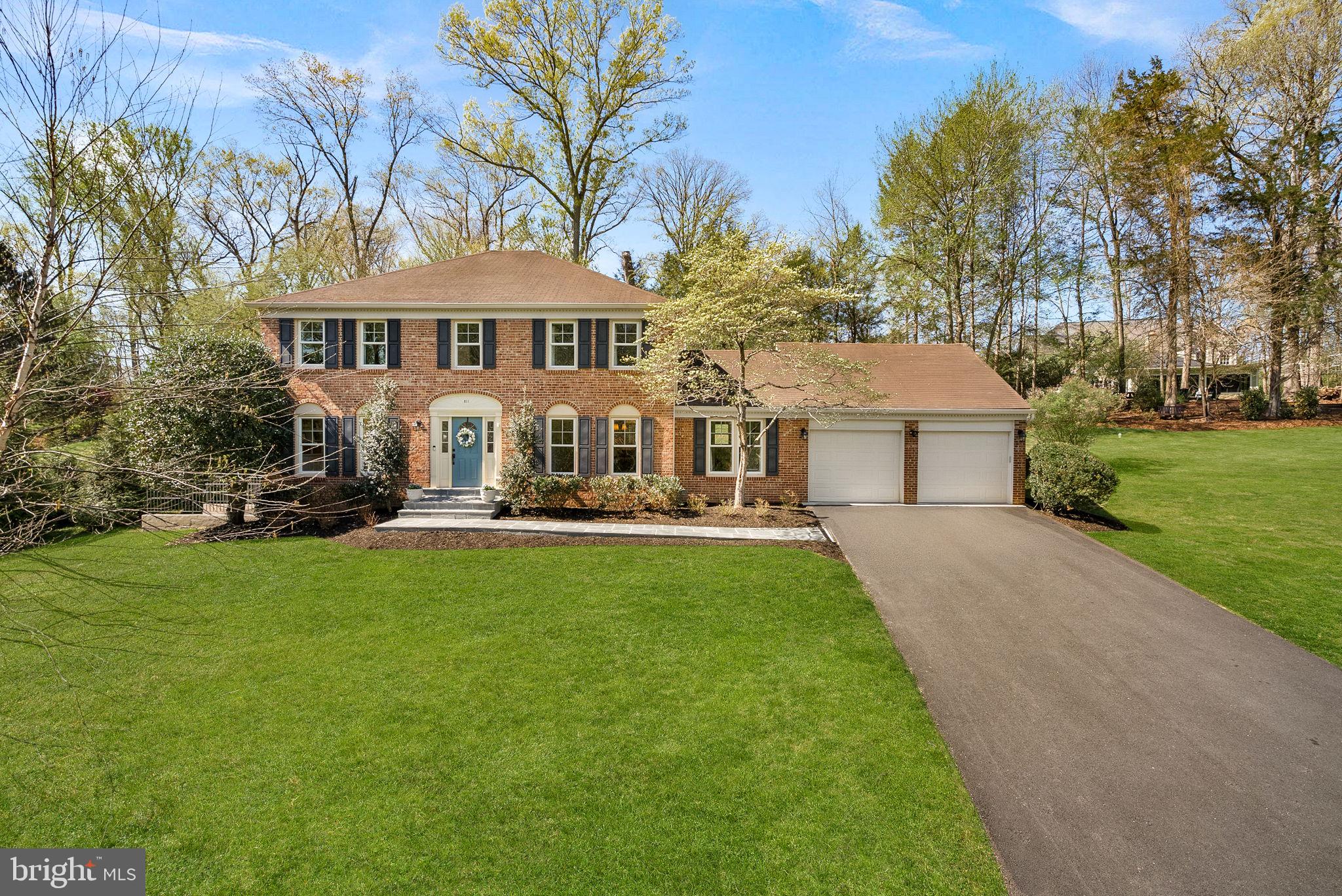 Beautiful brick-front colonial in the sought-after Hickory Creek neighborhood of Great Falls, ideally located just a short walk away from the Village of Great Falls with its charming shops and restaurants. This 4-bedroom, 3.5-bath home features stunning hardwood floors, a thoughtfully redesigned kitchen with modern finishes and updated appliances, a dedicated home office with custom built-ins, and a functional laundry/mudroom. The upper level includes a spacious primary suite with a fully renovated bath, along with additional bedrooms and updated bathrooms throughout. The finished lower level offers flexible living space perfect for a recreation room, gym, or guest area. Enjoy outdoor living on the expansive screened-in porch and improved deck overlooking a private lot, along with a newly paved driveway and added shed for extra storage. Located just around the corner from  playground, swim and tennis club, the Great Falls Library and local day schools. Major system and infrastructure upgrades include a new Lennox HVAC system in 2026, crawl space encapsulation-2021, radon mitigation system-2025, electrical setup for a portable generator-2021, and garage insulation and drywall-2022. Thoughtfully updated and meticulously maintained, this home offers the perfect blend of comfort, functionality, and prime location in one of Great Falls’ most desirable communities.