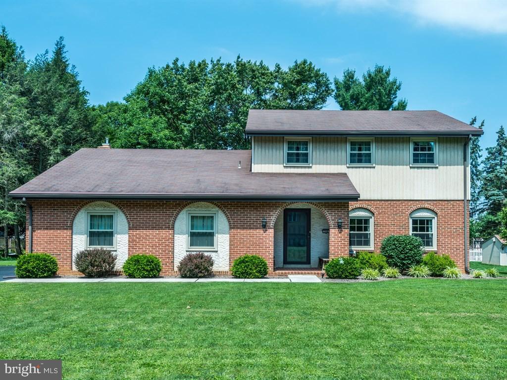 Don't miss out on this delightful home featuring plenty of charm and the inviting arched brick entry. Large living room, dining room, eat-in kitchen opens to the family room with vaulted ceilings and gas fireplace. 3 nice sized bedrooms, 2.5 baths, side load 2 car garage and a slate patio overlooking the level backyard. Plus a new shed as well. See list of the attached improvements.