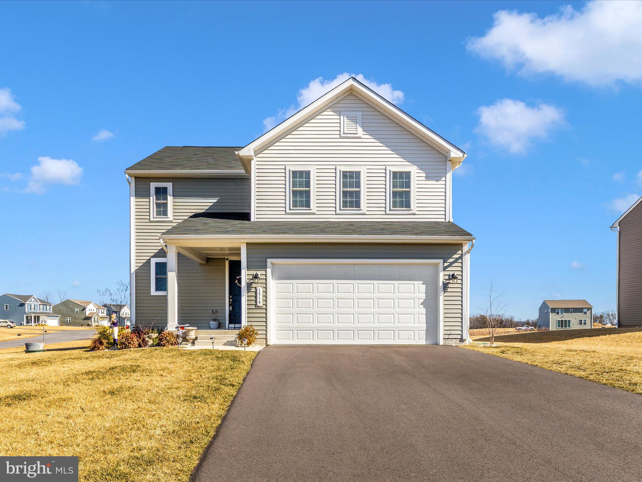 Remarkable Colonial at Warm Spring Ridge in Chambersburg. The main level features LVP flooring throughout,  foyer with closet, half bath, open concept living with living room, dining room, a luxurious kitchen with quartz countertops and island, stainless steel appliances, recessed lights, pantry, and doors to trex deck. The upper level offers a loft, linen closet in the hallway,  the primary suite has a walk in closet, enclosed bathroom with tile flooring and double vanities, convenient laundry room, 2 more generous sized bedrooms with closets and a full main bath. The finished basement has a bar, and a half bath. Other amenities include a Trex deck to enjoy and admire the surrounding country views and a 2 car garage. Fully fenced rear yard.