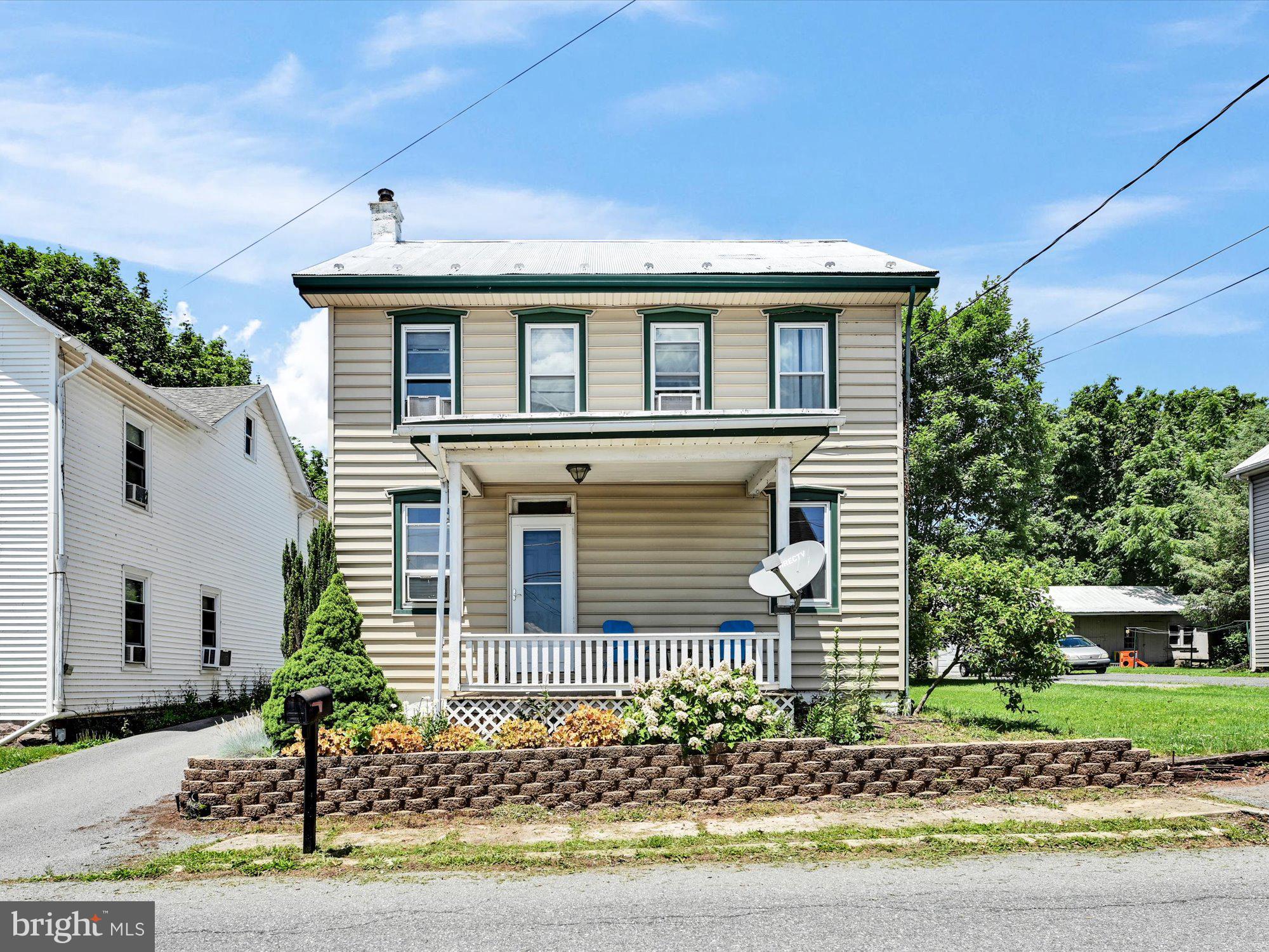 USDA approved single, perfect first time buyer home! Look no more! Three bedrooms, one full and one half baths with laundry, mud room and a dining room.  Plenty of off street parking, a one car detached garage and a nice level backyard.  This move in ready home awaits new owners.