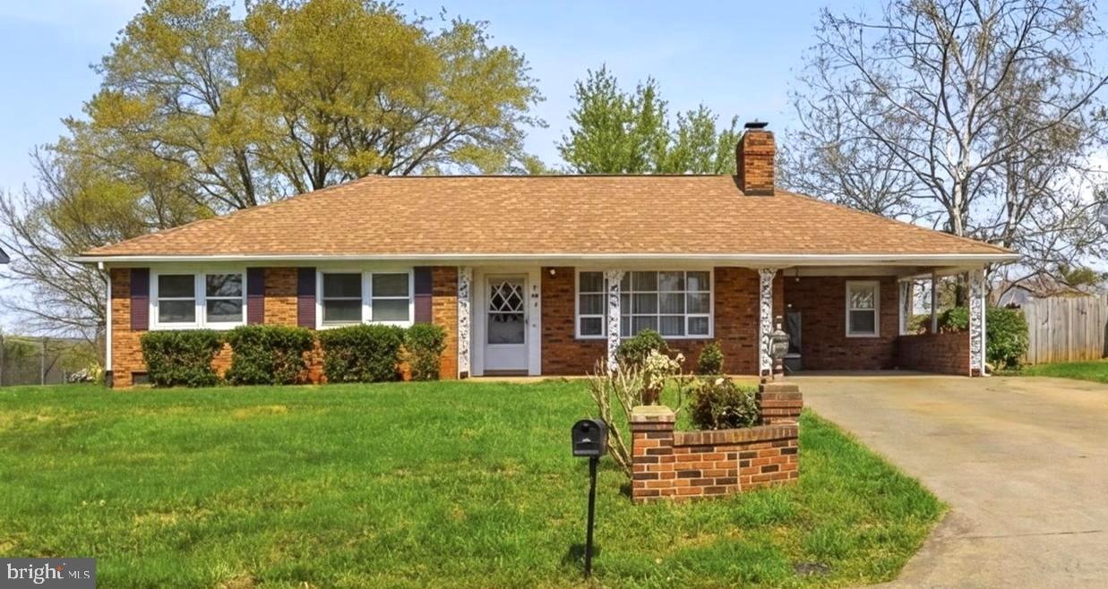 Welcome to 613 Overlook Street—charming in-town living in an established Culpeper neighborhood just moments from dining, shopping, and everyday conveniences. Enjoy the ease of being able to walk to local stores and eateries while still having a quiet place to call home.

This lovely all-brick ranch offers 3 bedrooms and 2 baths, filled with beautiful natural lighting and timeless character throughout. Recently refreshed with luxury vinyl plank flooring, updated appliances, and fresh paint, the home is truly move-in ready.

The living area is anchored by a hand-laid stone, wood-burning fireplace featuring rock sourced from Madison County’s Rose River. Beautiful crown and dental molding add warmth and craftsmanship you don’t often find.

The eat-in kitchen is perfect for those who love to cook, offering both functionality and space to gather. Additional features include a convenient carport entrance leading directly into the kitchen and a large mudroom for everyday ease.

Situated on a level lot, the expansive backyard offers plenty of space to relax, garden, or entertain, and includes a large storage shed for added convenience. Major updates provide peace of mind, with the HVAC, water heater, and roof all replaced in 2025.

Don’t miss this opportunity to own a beautifully updated home with character and convenience in the heart of Culpeper. Photos may be virtually staged