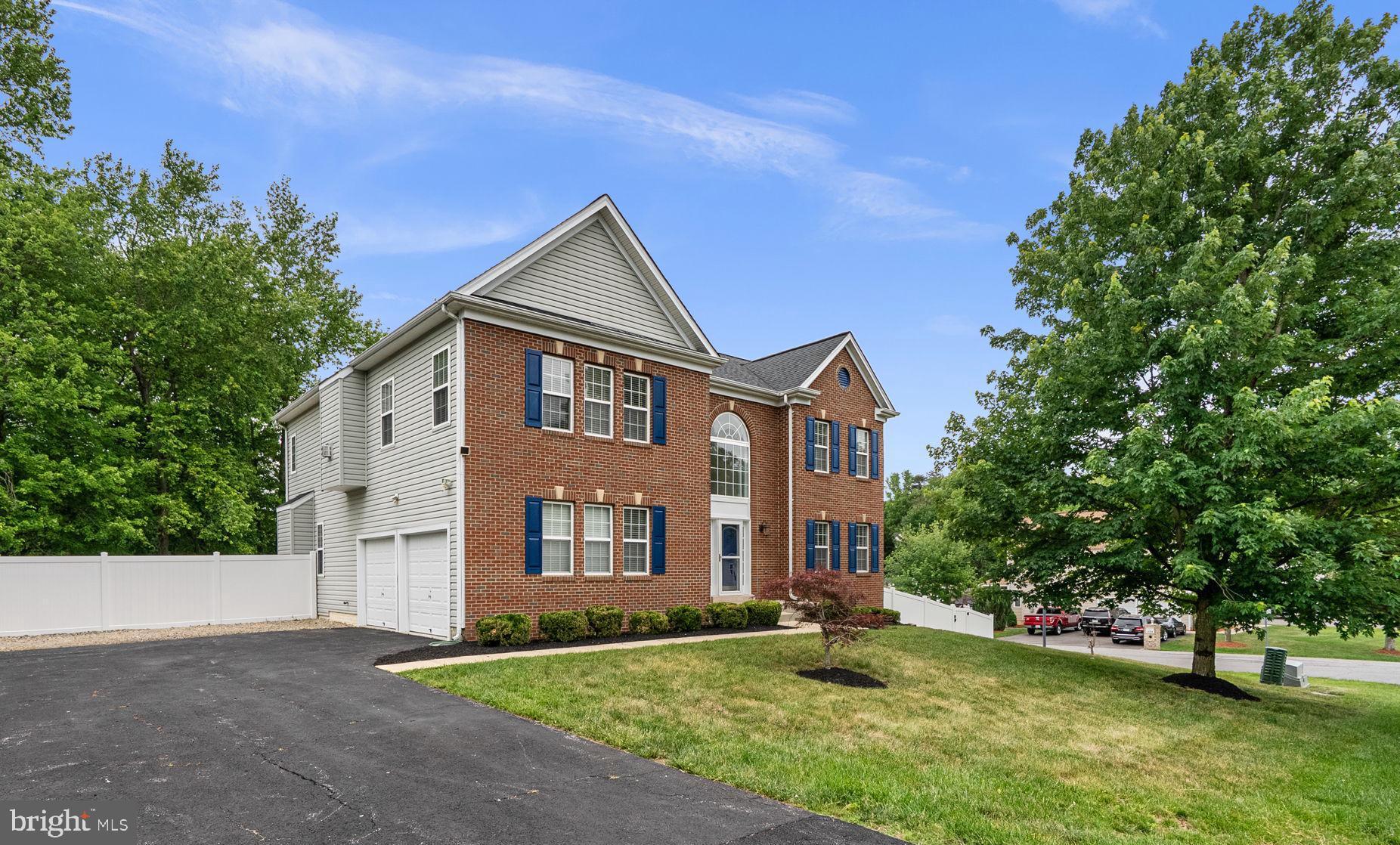 Due to the previous buyers' financing falling through, this beautiful property is available once again. Don't miss your opportunity! **Beautifully updated and exceptionally spacious, this stunning colonial offers over 3,400 square feet of finished living space with a grand open floor plan designed for both everyday living and entertaining. From the moment you enter the dramatic two-story foyer, you’ll appreciate the classic elegance, abundant natural light, and newly refinished hardwood floors throughout the main level. Fresh paint and new carpet make this home truly move-in ready.

The heart of the home is the expansive kitchen and family room, perfectly designed for gathering and entertaining. The kitchen features granite countertops, center island, stainless steel appliances, pantry storage, and ample cabinet space, all opening seamlessly to the spacious family room filled with windows and natural light, as well as a bright sunroom ideal for morning coffee or relaxing evenings.

Upstairs, the impressive Owner’s Suite serves as a private retreat, complete with a sitting room and cozy fireplace, large walk-in closet, and spa-like ensuite bath featuring dual vanities and a soaking tub. Three additional generously sized bedrooms and a full bath complete the upper level.

Step outside to enjoy the large fenced corner lot featuring multiple storage sheds, a freshly repainted oversized two-tier deck, and a private hot tub — creating the perfect outdoor oasis for entertaining or unwinding at the end of the day.

Additional highlights include a large unfinished walkout basement offering almost another 1,600 square feet of potential living space to finish, providing endless possibilities for a future recreation room, gym, home theater, guest suite, or additional entertaining space. The home also features a newer HVAC system, roof replaced in 2019, abundant storage throughout, and an exceptional amount of functional living space both inside and out.

This beautifully maintained home combines size, updates, flexibility, and outdoor living all in one incredible package — truly a must-see property.