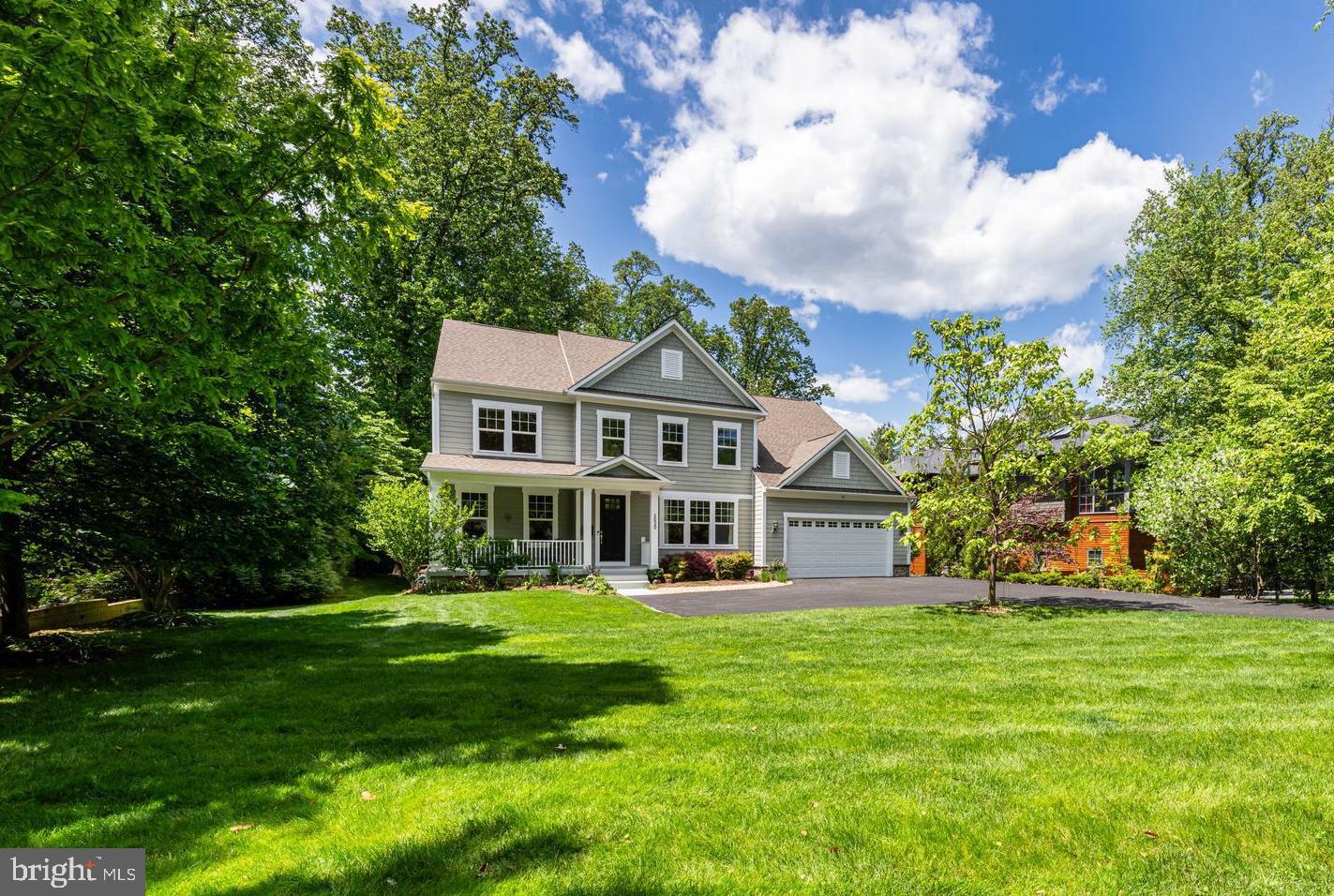 A Private Urban Retreat in the Heart of Franklin Park.
Sited on a flat, east-facing .69-acre lot in Franklin Park—one of McLean’s most desirable close-in neighborhoods—this exceptional property offers a rare combination of space, privacy, and gracious comfort. Surrounded by mature landscaping and specimen trees, this home is a private sanctuary just moments from city life. 
Built in 2015, this five-bedroom, four-and-a-half-bath residence welcomes you with sunlit interiors, nine-foot ceilings on all three levels, and Armstrong Prime Harvest Oak flooring throughout. The chef’s kitchen features Cambria quartz countertops, custom cabinetry, and premium stainless steel appliances, including double wall ovens and dual dishwashers. A vaulted sunroom and screened porch open to a deck with stairs leading to flagstone patios, a fire pit, and an expansive grassy backyard—ideal for entertaining, play, or quiet relaxation in the natural surroundings. 
Upstairs, the spacious primary suite offers a serene retreat with tray ceiling, a generously sized custom walk-in closet and spa-style bath featuring dual vanities, a soaking tub, and a walk-in shower with seamless glass door and rainfall head. Three additional bedrooms—each with blackout shades and generous closets—provide comfort and flexibility. The walkout lower level with full light includes a large recreation room, fitness space, guest suite with full bathroom, and access to the lower flagstone patio and gorgeous private backyard with mature landscaping and nature at your fingertips. 
Built with enduring quality, the home features steel I-beam construction, a 30-year shingle roof, dual HVAC zones, and two new 50-gallon water heaters (2025). A main-level two-car garage adds everyday convenience, while smart home integrations for lighting, irrigation, HVAC, and security—plus a Level 2 EV charger—deliver modern ease and efficiency. 
Enjoy nearby Chesterbrook Shopping Center, Linway Terrace Park, and Chesterbrook Swim & Tennis Club, with convenient access to Arlington, Washington, D.C., Tysons, and major commuter routes including Chain Bridge, the GW Parkway, I-66, and I-495. 
Franklin Park is beloved for its urban forest setting—a community where nature, privacy, and convenience coexist beautifully.