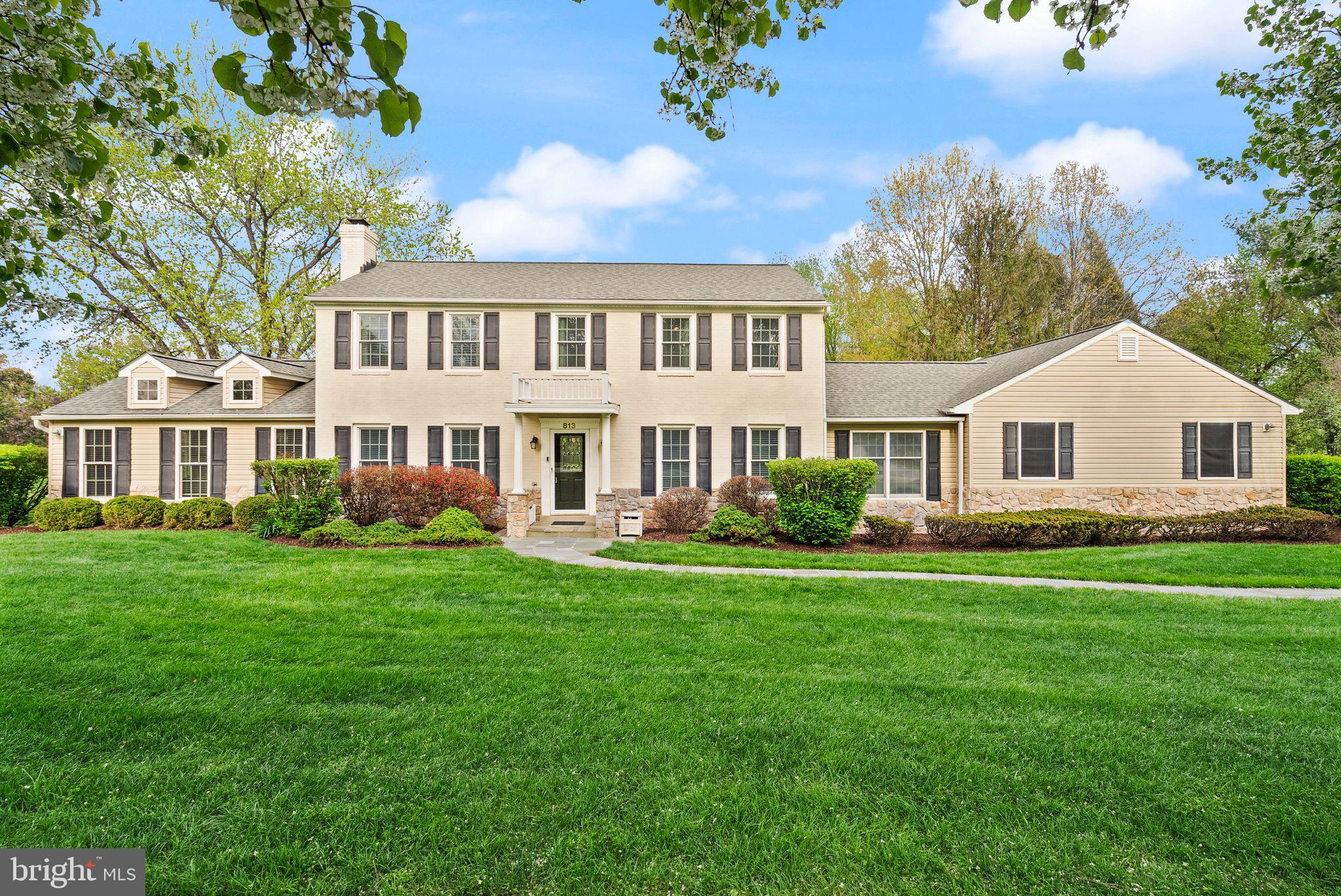 Experience a blend of refined architecture and natural surroundings in this beautifully updated white-washed brick and stone colonial, ideally located in the heart of Great Falls Village. Thoughtfully expanded and renovated, this home offers a balance of timeless design and modern functionality. The great room serves as a striking centerpiece, featuring soaring vaulted ceilings, a natural stone fireplace, and expansive windows that fill the space with light and offer tranquil views of the surrounding landscape.

A versatile main-level suite with a private entrance provides flexible use options, whether for guests, work-from-home needs, or additional living space. The screened porch offers a peaceful setting to relax or entertain while enjoying the outdoors in comfort. Step outside to a private backyard retreat featuring a beautifully designed freeform in-ground pool and spa, complete with equipment, creating an inviting space for relaxation and outdoor gatherings.

Car enthusiasts or those needing additional storage will appreciate the rare six-car garage capacity. Positioned within the Langley High School pyramid, this property combines comfort, space, and convenience in a highly desirable setting. Great Falls is known for its scenic character, spacious properties, and strong sense of community. The nearby village center offers a variety of shops, dining options, and local events throughout the year, creating opportunities to connect and enjoy everyday conveniences close to home. Outdoor enthusiasts can take advantage of nearby parks, trails, and equestrian facilities, while the Potomac River and its surrounding parkland provide a picturesque backdrop for recreation and exploration.

With its blend of privacy, accessibility, and thoughtfully designed living spaces, this home presents a unique opportunity to enjoy all that Great Falls has to offer.