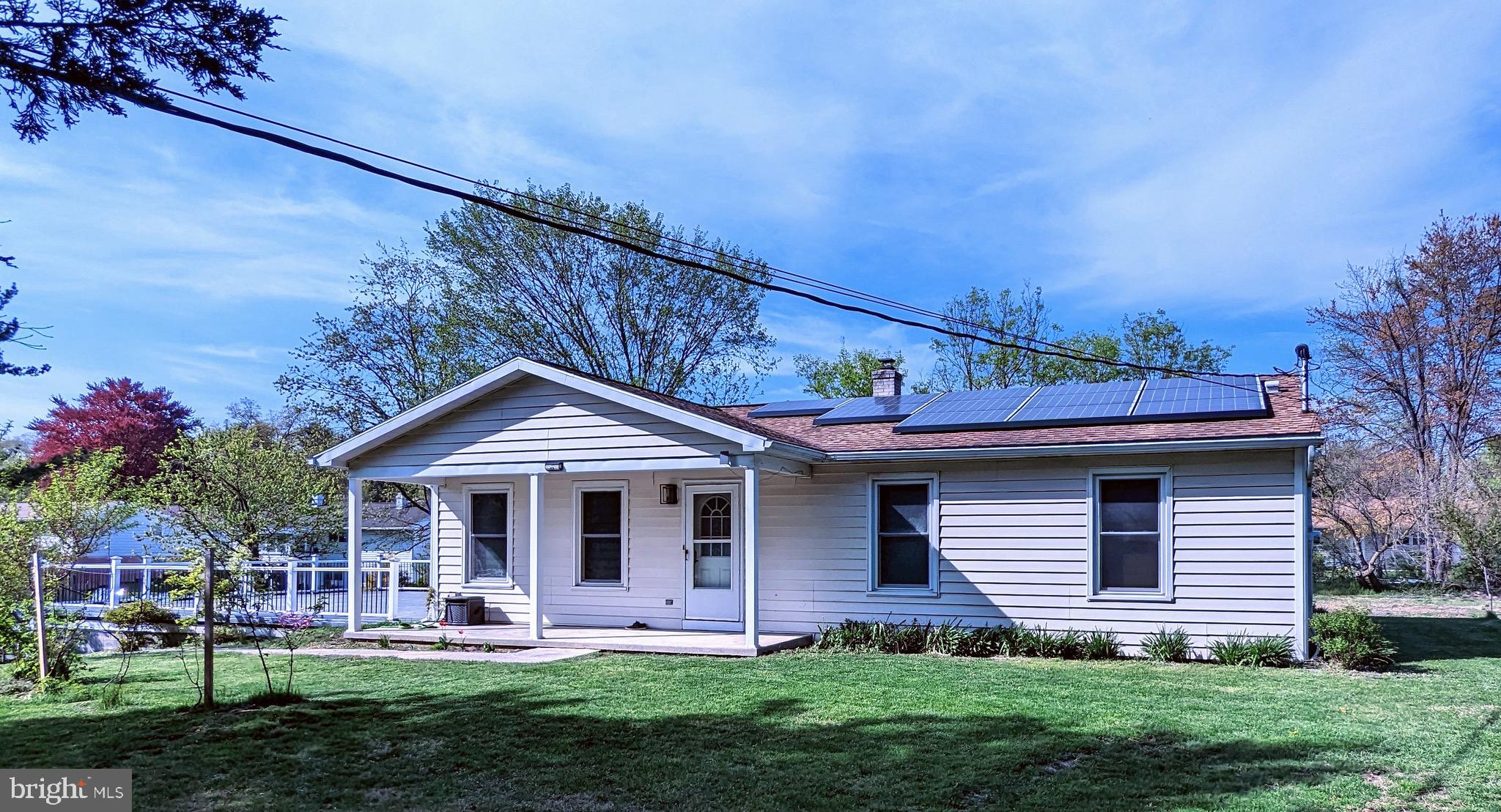 This Delightful, Well cared for Modern Ranch Home in the Heart of Suburban Harrisburg is Perfect for Homebuyers who are looking for primarily One-level Living, yet with a convenient, spacious Lower Level with Oversized 2 Car Garage, along with additional Bedroom Space, Storage, and Workshop.  4 Bedrooms, 2 Full Baths (one on each Level), Rich Hardwoods, Fully Featured Kitchen, Luxurious Sunroom for Dining and Relaxing/Entertaining, and Beautifully Cared for Landscape, which includes a Koi Pond and over a Dozen Fruit Trees (Persimmons, Pear, Apple, Japanese Plums, Peaches, Cherries, Apricots, Grapes, and more).   You'll love your Low, Low Electric Bills from the discreetly placed Solar Panel System.  A Wonderful Place to Call Home!   See it Today!