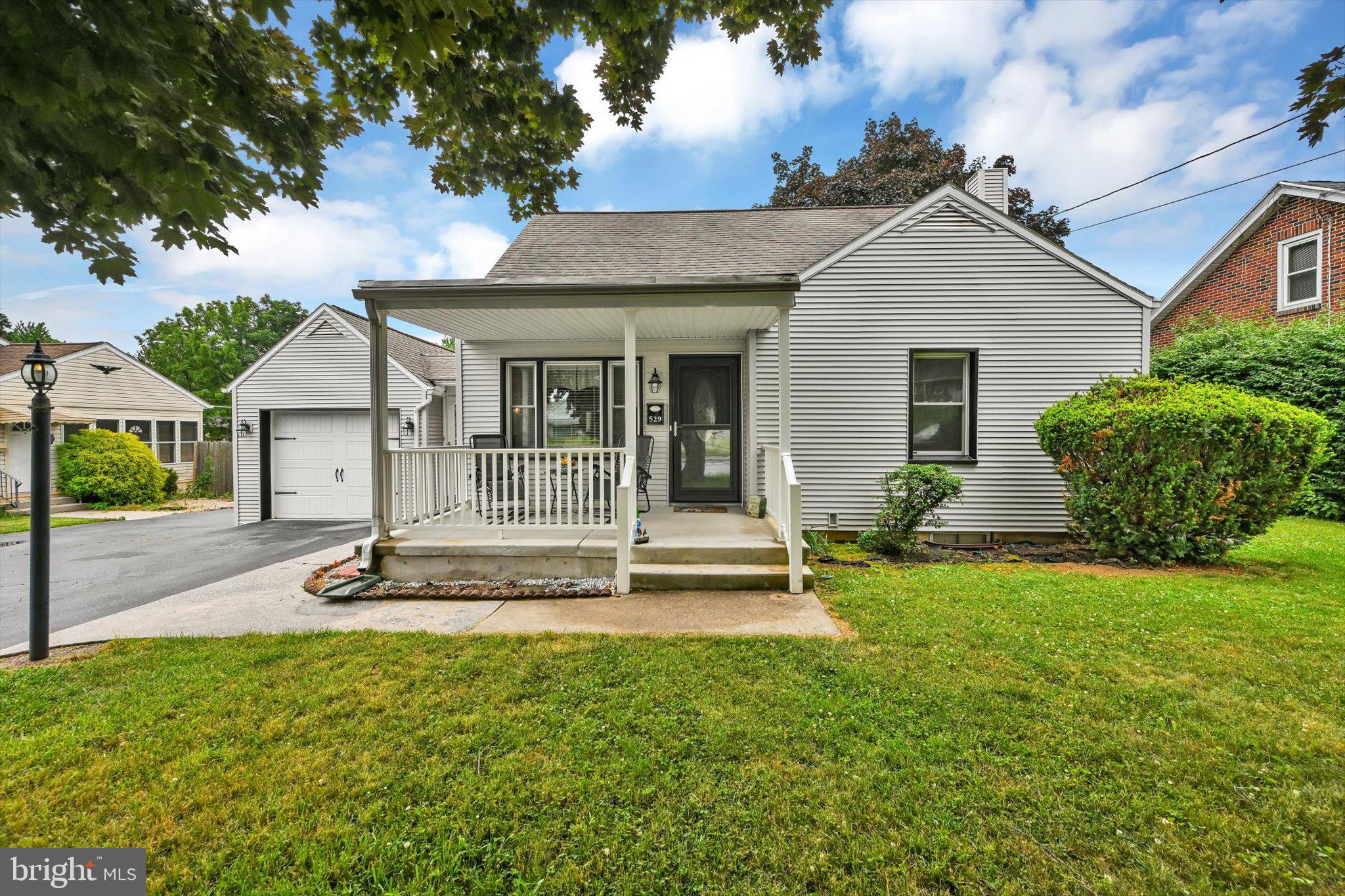 Beautiful Cape Cod featuring 3 bedrooms, 2.5 bathrooms & Hardwood floors in the bedrooms and Living room area. Main bathroom has a walk in shower.  Finished basement with a beauty shop with its own entrance and half bath.   New front porch, Large fenced in back yard and a covered patio.