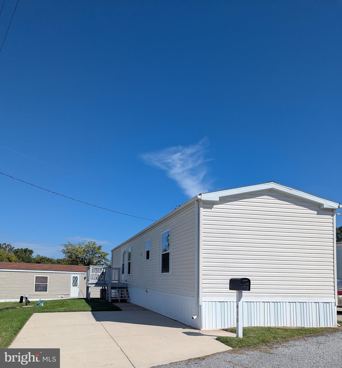 Attention buyers $5000 off purch price or 2 months free rent if under contract before June 30, 2026 !!!!!
THIS MOBILE HOME FOR SALE NOT RENT, ONLY THE LOT IS LEASED!!!! 
Move-in ready 2018 Champion single-wide mobile home featuring 2 bedrooms and 2 full baths. The bright and open floor plan offers comfortable living with carpeted spaces and a well-appointed kitchen that includes a water filtration system, microwave, dishwasher, washer, and dryer—all conveying. Designed for convenience and functionality, this home provides everything you need in a modern, low-maintenance space. Public water and sewer are paid by the resident.   

Community Information
Lot rent is $825 per month and adjusts per park rules. All residents must be park-approved, and community rules are uploaded in the documents section. Please use the contract provided in the document section when submitting offers.