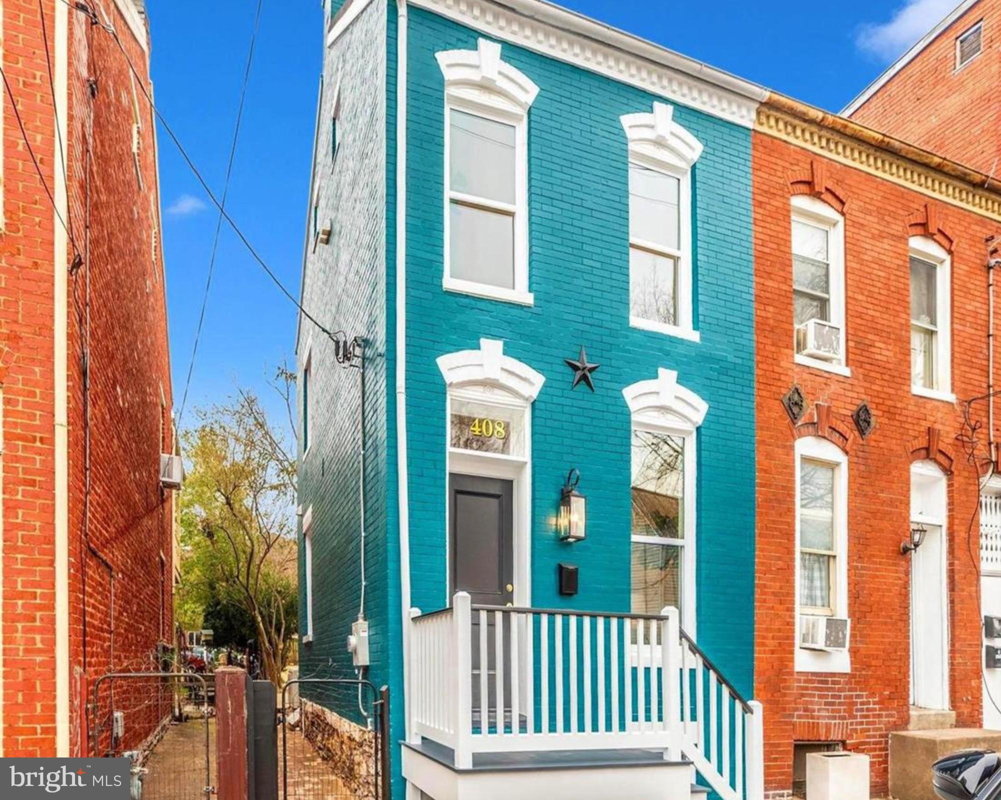 COMPLETELY RENOVATED and rich with historic charm, this pre-Civil War brick home in the heart of Downtown Frederick blends timeless character with modern comfort. Featuring tall ceilings, abundant natural light, warm wood floors, and a conveniently located half bath on the first level, the home offers an inviting layout where the living room’s exposed brick fireplace flows seamlessly into the dining area with a charming open staircase. The updated kitchen is thoughtfully designed with quartz countertops, stainless steel appliances, a deep sink, and casual seating. Upstairs, the second level offers two bedrooms, including a primary bedroom with a large walk-in closet, along with a separate full hall bath featuring a walk-in tiled shower with glass enclosure. The third-floor loft with exposed brick, sloped ceilings, and a mini-split system providing heating and cooling. This is a versatile bonus space ideal for a home office, studio, or guest retreat. Outside, the backyard has been professionally landscaped with brick patios and perennials, creating a private, fenced oasis. Fully permitted and renovated to city standards, this home offers the best of downtown living just steps from shops and dining.