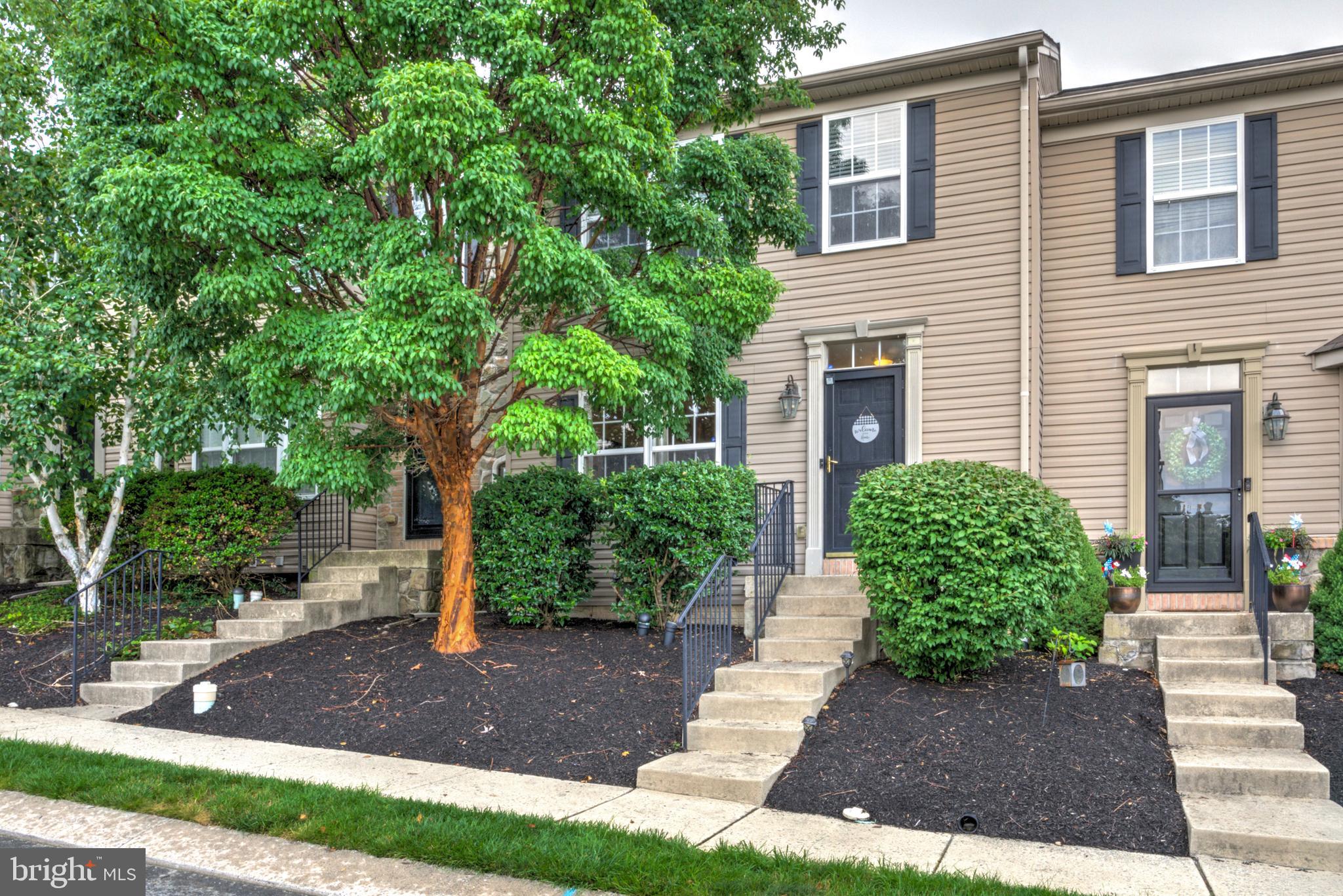 Welcome home to this beautifully maintained 3-bedroom, 2½-bath townhome in a desirable Millersville location! The spacious living room features attractive hardwood floors, creating a warm and inviting space for relaxing or entertaining. The bright kitchen offers an island and a dining space with sliding patio doors that open to a recently stained and sealed deck—perfect for outdoor dining, grilling, or enjoying your morning coffee. The primary bedroom suite includes a walk-in closet and a private full bath. Two additional bedrooms share a second full bathroom, providing plenty of room for family or guests. The finished lower-level family room offers extra living space that can be used as a recreation room, home office, or media room. Two off-street parking spaces add convenience. Enjoy a low HOA maintenance fee and an unbeatable location within walking distance of Millersville University, restaurants, shopping, and other local amenities. Don’t miss the opportunity to own this beautiful, move-in-ready home!