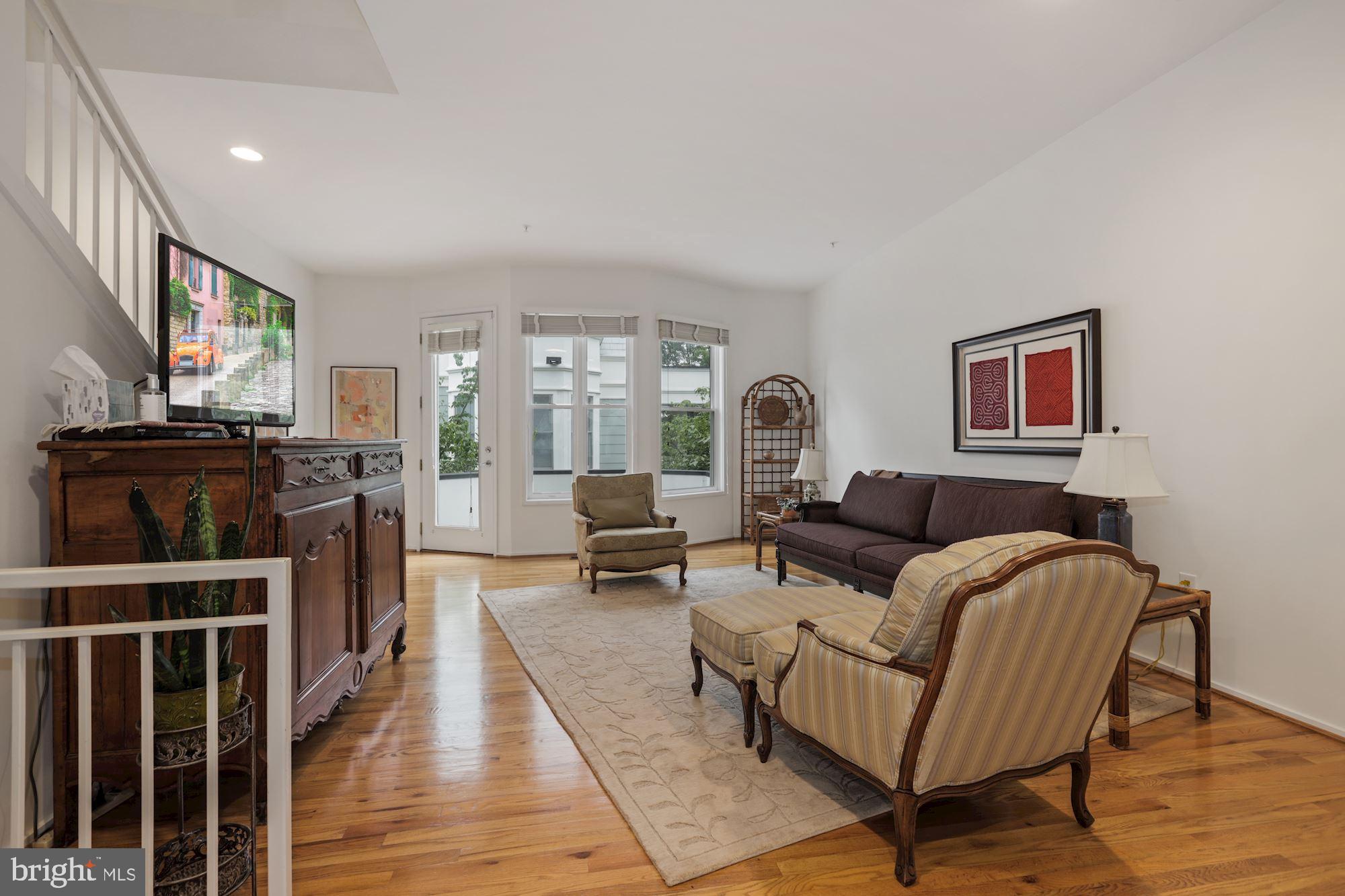 Located in a quiet enclave of North Arlington, just a short walk to Clarendon and Ballston, this incredible home is perfect for spreading out or coming together. Close to hot spots with a walk score of 85 (see map hot spots on virtual tour) in the sought after and super active community of Cherrydale (cherrydale.net), you can’t beat this location. And the home’s layout is perfect for today’s needs. Enjoy fresh air in one of 3 nearby parks. Or plan a stress-free commute on Metro just over 1 mile away or with easy access to I66 and Spout Run. There are even bus routes to Ballston, Rosslyn or DC from Lee Highway or nearby Quincy Street.  A modern, 4-level, 3-bedroom plus den townhome (video at: https://vimeo.com/458308785), your honey-do list won’t include upkeep items. Great entertainment features include an open floorplan, an upgraded kitchen with center island, gas cooking, gleaming hardwood floors, 9-foot ceilings, a gas fireplace and spacious work- or school-from-home rooms spread across 3 other levels with a balcony off the living room and tremendous natural light for screen relief. The primary owners' suite has an entire level to itself with sitting area, expansive walk-in closet and en-suite bath with dual vanities, separate shower, jetted tub and a separate water closet. The top level of this home has two airy and sun-filled bedrooms with vaulted ceilings, a wall of closets in each and a peek-a-boo view of the National Cathedral. The hall bath on this level was beautifully renovated from top to bottom in 2019. This home has great storage with large closets and an oversized, 2-car garage.  Take a quick lunchtime breather over to Quincy Park and Oak Grove Park. Or venture a little further to nearby Custis Trail (4 blocks away) or Potomac Regional State Park (5 minute drive).  To top it all off, this home is in bounds for the Taylor - Dorothy Hamm - Washington Liberty school pyramid. An incredible find right here in your backyard! View video at: https://vimeo.com/458308785 www.Cherrydale.net
