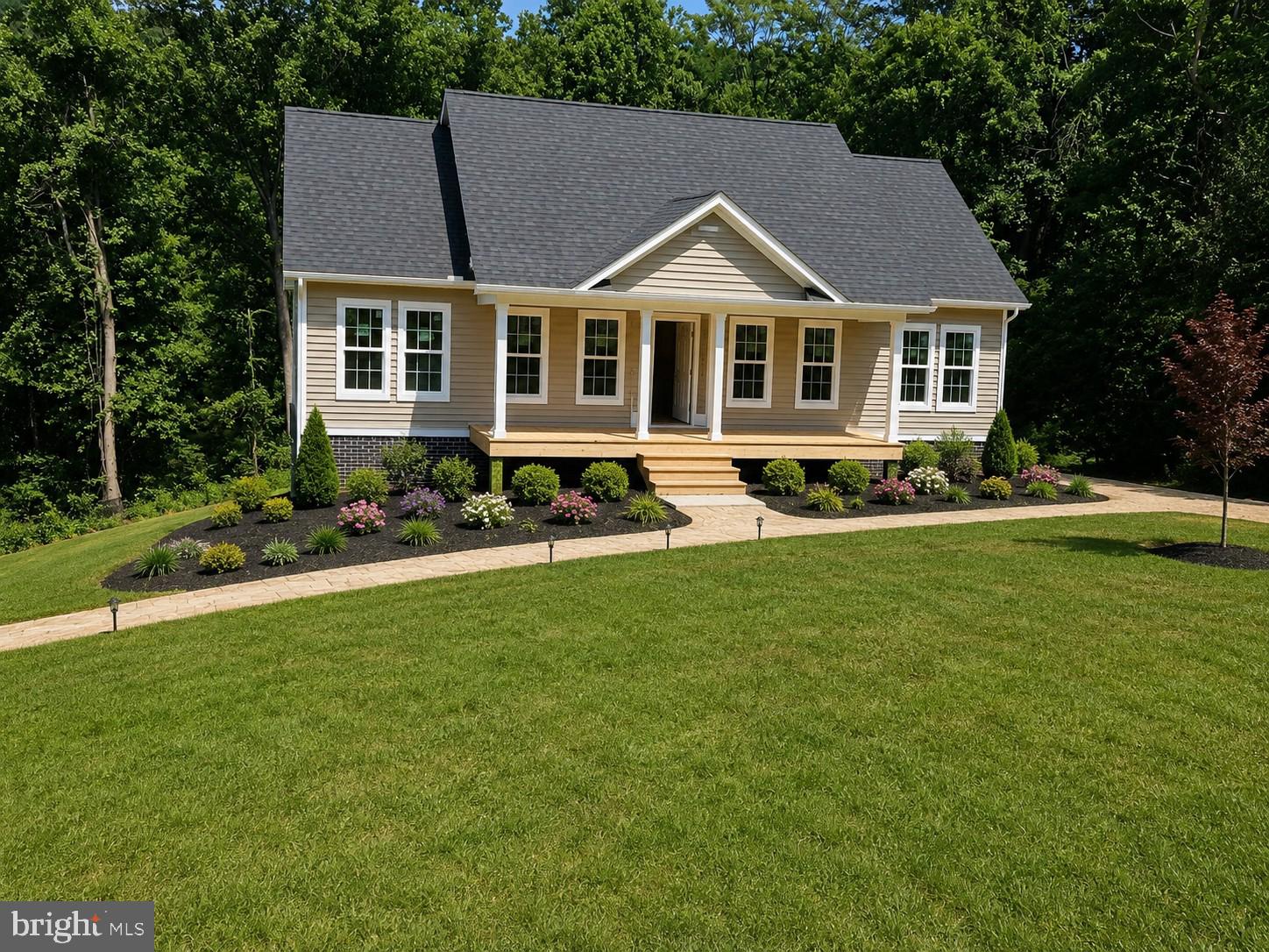 NEW CONSTRUCTION | LAKE ACCESS | READY SEPTEMBER 1ST

Discover the perfect blend of modern comfort and outdoor living in this brand-new home, scheduled for completion by September 1st. Situated on nearly a half-acre lot, this thoughtfully designed residence offers approximately 1,400 finished square feet above grade, plus a full unfinished walk-out basement with rough-in plumbing for a future full bath—providing the opportunity to nearly double your living space.

Inside, you'll find an open-concept floor plan featuring vaulted ceilings in the great room, dining area, and kitchen, creating a bright and spacious atmosphere. Luxury vinyl plank flooring flows throughout the main living areas, while ceramic tile accents the bathrooms. The kitchen is designed for both style and functionality, offering easy-close cabinetry, a center island, granite or quartz countertops (allowance provided), and a $4,000 appliance allowance.

The primary suite serves as a private retreat with a tiled shower, cultured marble vanity, and ceramic tile flooring. A second full bath features a tub/shower combination and ceramic tile flooring.

Exterior highlights include a covered front porch, rear pressure-treated deck with railings, architectural shingle roof, vinyl siding, underground electric service, 50-gallon water heater, and an energy-efficient 14 SEER heat pump. The walk-out basement is filled with natural light thanks to numerous windows and offers endless possibilities for future expansion.

Located just minutes from I-66 and I-81, this home provides convenient access to wineries, golf courses, hiking trails, shopping, and historic downtown Front Royal. High-speed internet availability makes working from home a breeze. Residents will also enjoy private lake access, community common areas, and endless opportunities for boating, fishing, and relaxation. One year builder warranty backed by DPOR
