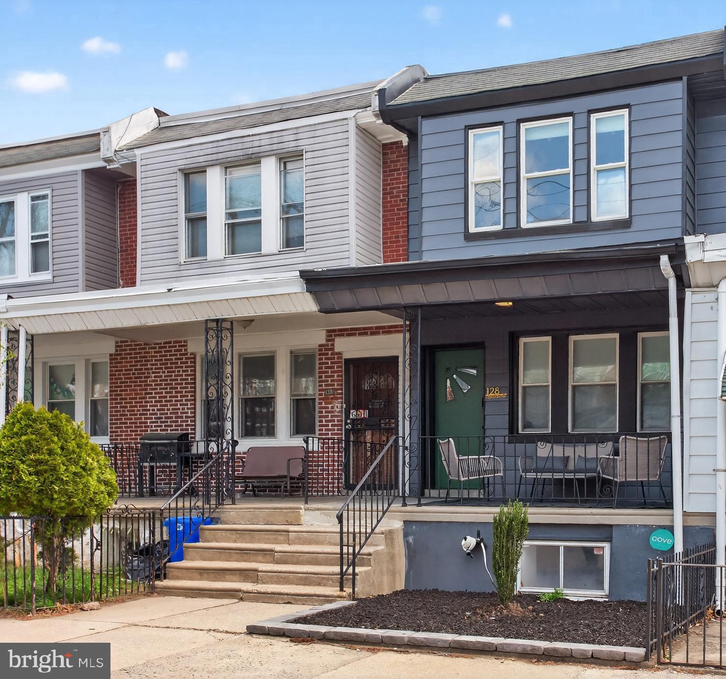 **$5,000 SELLER ASSIST OFFERED!!** Welcome to 128 E Tulpehocken Street! This beautifully renovated 3-bedroom / 2.5 bathroom  East Germantown row home blends modern upgrades with thoughtful design throughout. Step up to the inviting front porch and into the open-concept main level, where hardwood floors and recessed lighting create a warm, contemporary feel. The spacious living area flows seamlessly into the dining space, perfect for entertaining or relaxing at home, and is complemented by a stylish powder room. A convenient under-stair closet offers flexible storage as a pantry or coat closet. The kitchen is a true highlight, featuring porcelain tile floors, stainless steel appliances, quartz countertops with ample workspace, shaker-style cabinets and a tasteful ceramic tile backsplash. Just off the kitchen, a private balcony provides the perfect spot for your morning coffee or a quiet evening unwind. Upstairs, you’ll find 3 bedrooms. The rear bedroom offers generous space and ample closet storage, while the middle bedroom is ideal for guests, a nursery, or a home office. The full hall bathroom showcases a modern vanity, porcelain tile flooring, a subway-tiled tub/shower combo, and a classic Philadelphia skylight that fills the space with natural light. The primary suite, located at the front of the home, features a bright, spacious layout and an ensuite bathroom with a subway-tiled stall shower, tiled floors, and a sleek vanity. The fully finished walkout basement is perfect for a media room, gym, or office and provides direct access to the rear patio and one-car garage. Additional highlights include hardwood flooring throughout, recessed lighting, stainless steel appliances, and a new 4-zone mini-split system for efficient, customizable comfort.  Schedule your showing today!!