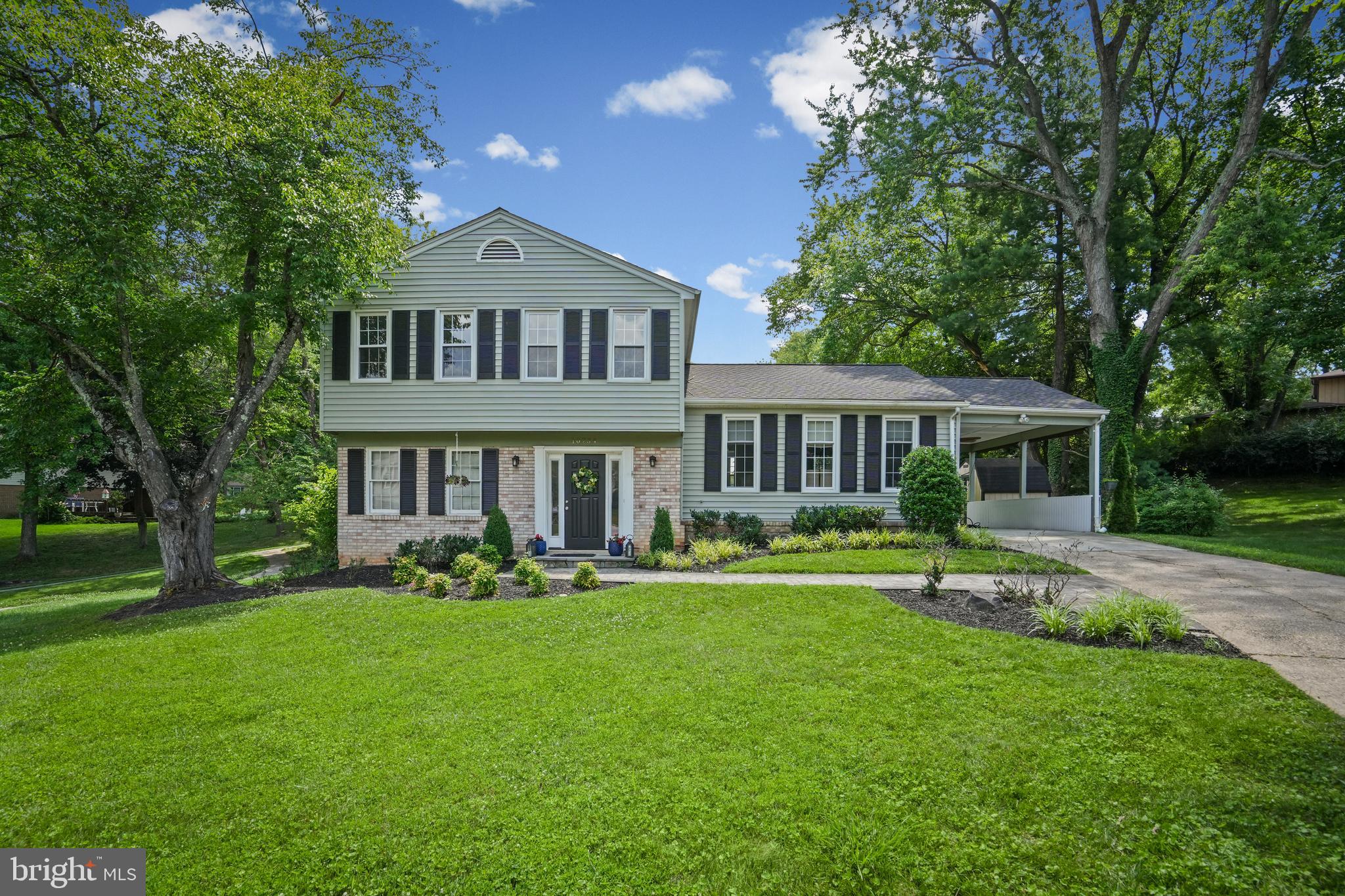 Discover the perfect blend of comfort and functionality in this move-in ready split-level home, located in the heart of Columbia. The warm and inviting main level features a comfortable living room centered around a wood-burning fireplace, along with a spacious bedroom that can easily serve as a home office, guest room, or additional flex space. The main level also offers a full bathroom.

Just a few steps up, you'll find a beautifully appointed kitchen with stylish finishes and picturesque views of the backyard. This level seamlessly connects the kitchen, dining area, and additional living space, creating an ideal layout for both everyday living and entertaining. The upper level features three spacious bedrooms and two full bathrooms.

The backyard offers a serene setting for relaxing, with a recently updated deck that creates an inviting outdoor retreat to enjoy throughout the seasons.

Ideally located just minutes from Columbia Town Center, Merriweather Post Pavilion, Wilde Lake, parks, walking trails, shopping, dining, and major commuter routes, this home pairs a versatile floor plan with easy access to everything Columbia has to offer.
