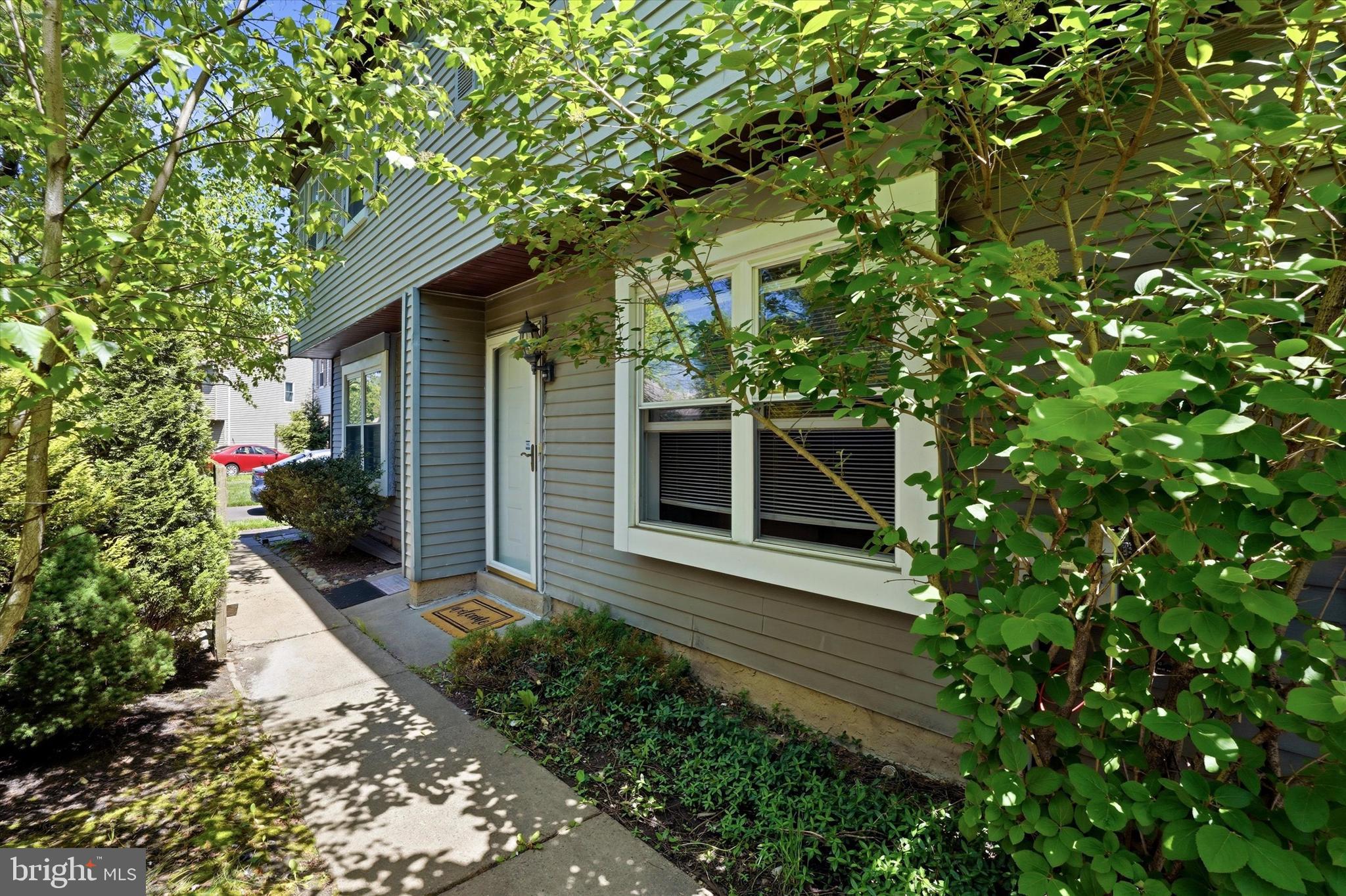 Welcome to 2 Horseshoe Circle in Horshamtown, a 3-bedroom, 1.5-bath twin home offering 1,476 square feet of comfortable living space, a great corner-lot setting, and no HOA fees. Set in a cul-de-sac, this home gives you the benefit of a quieter street setting, a large driveway, and a spacious backyard with a patio that is ready for outdoor dining, relaxing, or entertaining.

Inside, the first floor offers an open-concept layout with an easy flow from room to room, while still providing a separate dining area for meals, gatherings, or everyday use. The living room features a fireplace that adds warmth and charm, creating a comfortable place to unwind. The kitchen is well appointed with stainless steel appliances, including a range, microwave, and dishwasher, making daily meals and hosting simple.

One of the best features of the home is the expansive family room at the back of the house. With sliders leading directly to the backyard, this space feels bright, open, and flexible. Use it as a second living area, media room, home office, or gathering space.

Upstairs, you’ll find three bedrooms, a full bath with a tub, and the convenience of upstairs laundry. The location is another major plus, with walking-distance access to the Powerline Trail and close access to parks, shopping, restaurants, and the PA Turnpike.