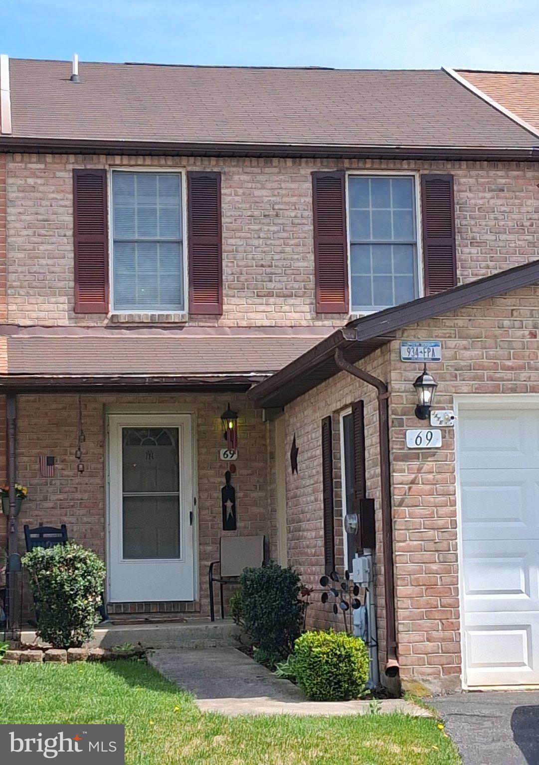 This charming bi-level townhouse, built in 1990 being sold AS IS, offers a delightful blend of comfort and functionality. With 1,120 sq. ft. Enjoy the warmth of carpeted floors and the convenience of a ceiling fan, creating a welcoming atmosphere throughout. The kitchen is equipped with essential appliances, including a dishwasher, electric oven/range. The primary bath adds a touch of convenience, while the additional half bath is perfect for guests. Step outside to discover inviting patios and porches, ideal for enjoying morning coffee or evening relaxation. The exterior is adorned with thoughtful lighting and sidewalks, enhancing the neighborhood's charm. Parking is a breeze with an attached garage and additional driveway spaces. Located in a vibrant community, this home is just a short distance from public transportation, making commuting easy. The neighborhood boasts excellent schools, well-maintained parks, and a variety of local amenities, ensuring a fulfilling lifestyle. This property is not just a house; it's a place to create lasting memories. Experience the comfort and convenience of this lovely townhouse in a welcoming community! Don't delay schedule your private showing today.