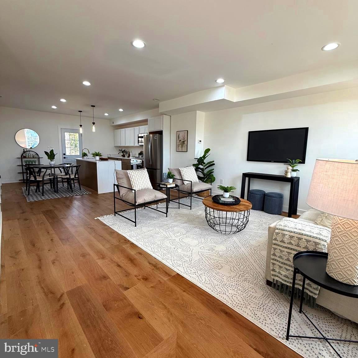 Fully renovated luxury Baltimore rowhome rebuilt from top to bottom with clean modern design, quality craftsmanship, and strong natural light throughout.

Open-concept layout with 5-inch white oak hardwood floors, recessed lighting, and oversized windows. The kitchen delivers with a waterfall quartz island, custom cabinetry, and sleek stainless steel appliances  built to impress and function.

Upstairs features spacious bedrooms and a spa-style bath with modern tile and finishes. Custom iron railings add a refined architectural edge.

Finished lower level offers flexible living space for a rec room, office, or guest suite.

All major systems are brand new: roof, electrical, plumbing, HVAC, windows, kitchen, baths, and flooring ,offering true peace of mind.

Priced below market and below appraised value (269K). Recently reduced for immediate action — positioned for the buyer who recognizes value when they see it.

Schedule your showing.
