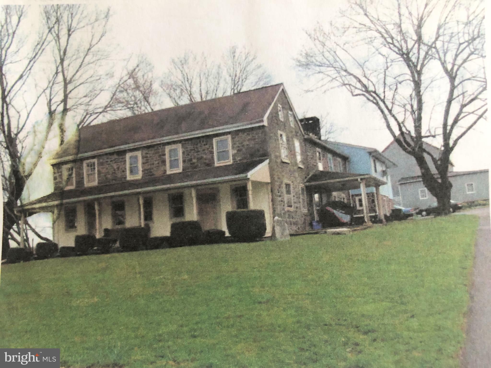 This Classic 1860 Stone Farmhouse has been expanded to include an In-Law Suite, Barns, Garages and MORE!

Just under FOUR Acres in the Desired Souderton Schools, the home sits off the road in a private and quiet location.

The house has been expanded with FULL In-Law Quarters making it perfect for the In-Laws or an Au pair!

The Main Living Area has Two Large Living Rooms with Stone Fireplaces, AND an oversized Family Room too! 

The In-Law Quarters are also spacious with Two Bedrooms, Two Baths, an Eat-in Kitchen, and a Large Living Room.

Each Living Area has its own entrance and laundry room too!  

The Bank Barn AND the Pole Barn are great for storage or stalls!

Maybe you fancy yourself a Gentleman Farmer or you always wanted to live with your horses, cows, goats and chickens? 

Or maybe you collect cars or antiques? 

Or you have a lot of outdoor toys?

Or you have work trucks that need to be stored? 

Or maybe you’re an artist that needs a studio?

Or you work from home & need peace & quiet? 

Then this may be the dream home you’ve been looking for!

The House is one thing, but the Large Bank Barn, with an Attached One Car Garage AND a separate 40' x 60' Pole Barn with a Concrete Floor AND an additional Oversized, Heated 1.5 story, FOUR Car Garage (34' x 48') AND an 18' x 12' Shed make this a Unique Property with so much potential!

Located close to Downtown Harleysville (Halfway between Philly and Allentown), driving distance to the Montgomeryville and Limerick Shopping Districts, close to all major roadways AND the turnpike & walking distance to Parks with running tracks & a tot-lots is fantastic for the active person!