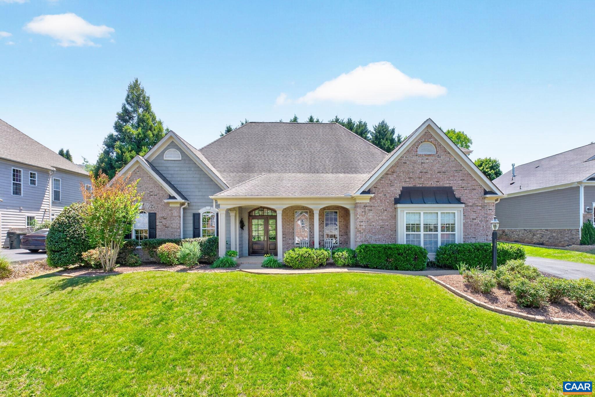 OPEN HOUSE-Sunday-7/19 from 12-2pm. A truly unique custom-built home, exceptional in its design, craftsmanship, and architectural detail. From the moment you arrive, the striking mahogany front door sets the tone for the quality and character found throughout. Inside, you'll find thoughtfully designed main-level living enhanced by extensive wainscoting, crown molding, and upgraded trim. The great room features custom built-ins, while the kitchen showcases soapstone countertops, a farmhouse sink, and coffered ceilings that blend style and function. The primary suite offers a private retreat with a luxurious soaking tub. An additional living area with a kitchenette provides the perfect space for an in-law suite or extended guests. Storage is abundant throughout, with a spacious  oversized garage, an outdoor storage shed, and a deck storage box providing ample room for all your belongings. Step outside to enjoy the private backyard, ideal for relaxing or entertaining. Additional features include a generator hookup, water softener system, and a utility sink in the laundry room. This exceptional home offers timeless design, quality construction, abundant storage, and the flexibility today's buyers are looking for.,Fireplace in Great Room